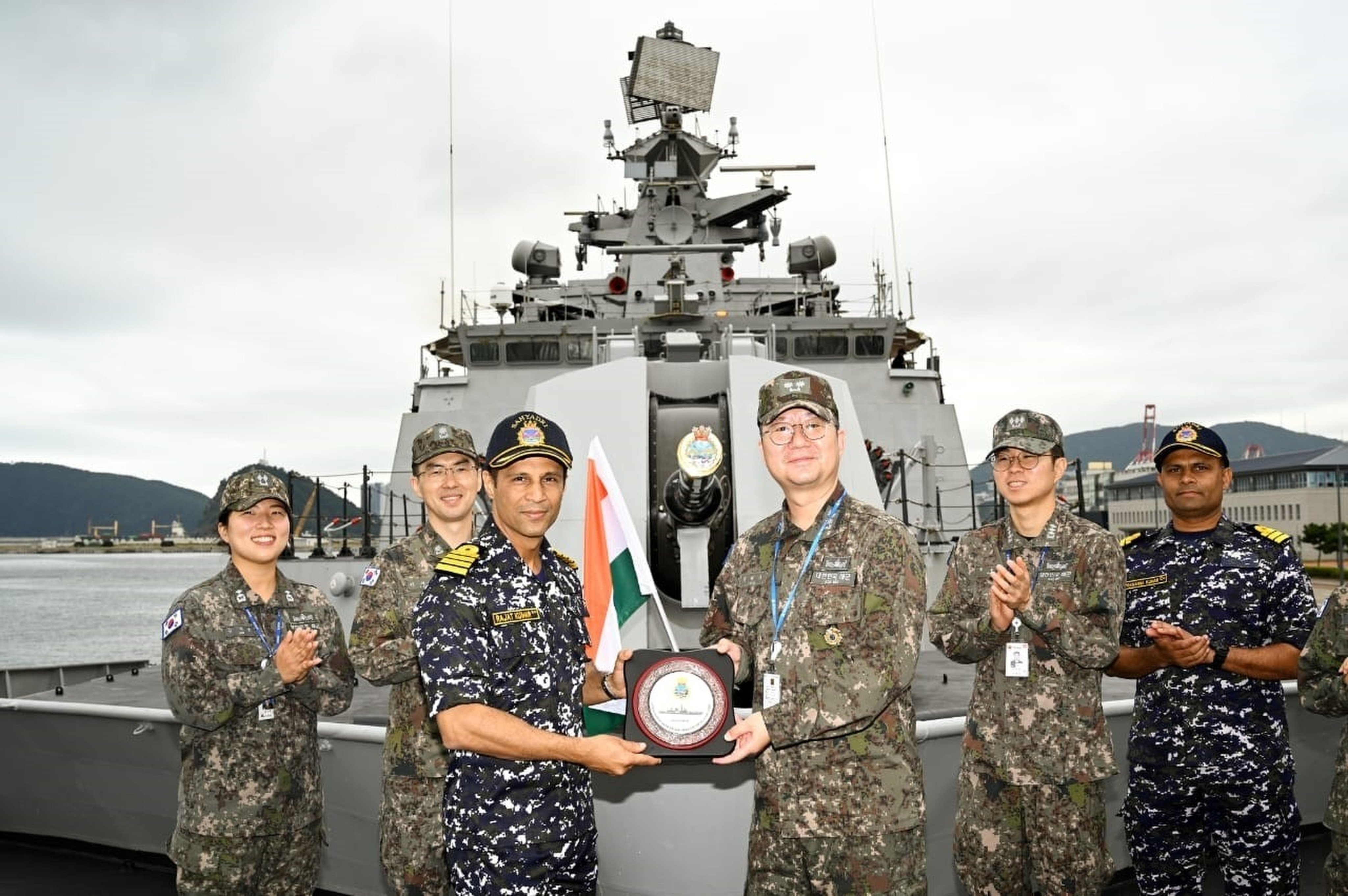 Indian and South Korean navy officers pose aboard the Sahyadri during their first-ever bilateral naval exercise, in Busan on October 13. Photo: Handout