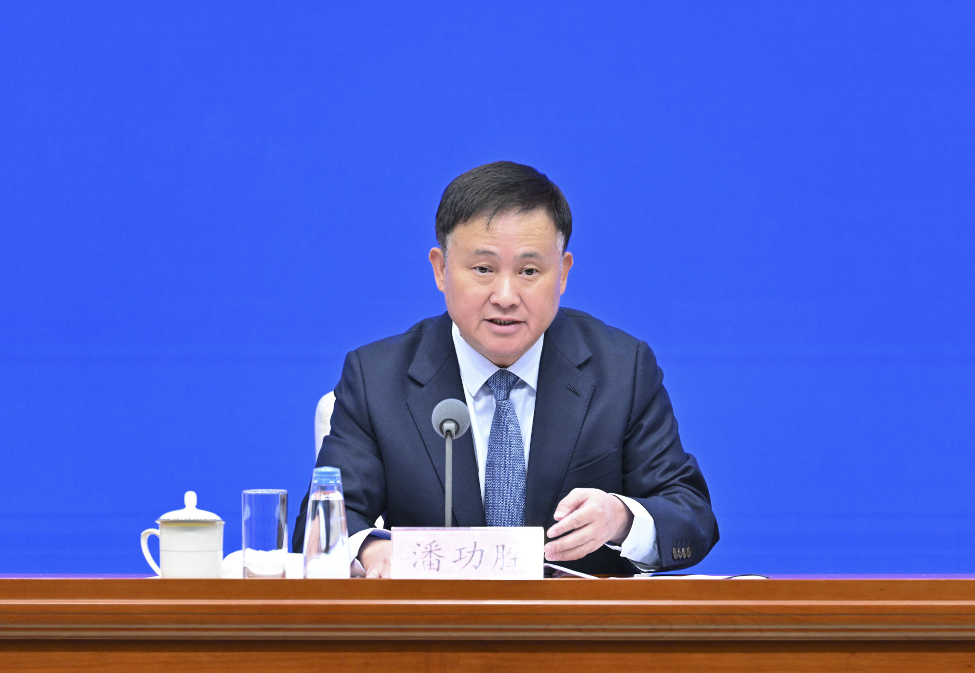 Pan Gongsheng, governor of the People’s Bank of China, speaks at a press conference last month in Beijing. Photo: Xinhua