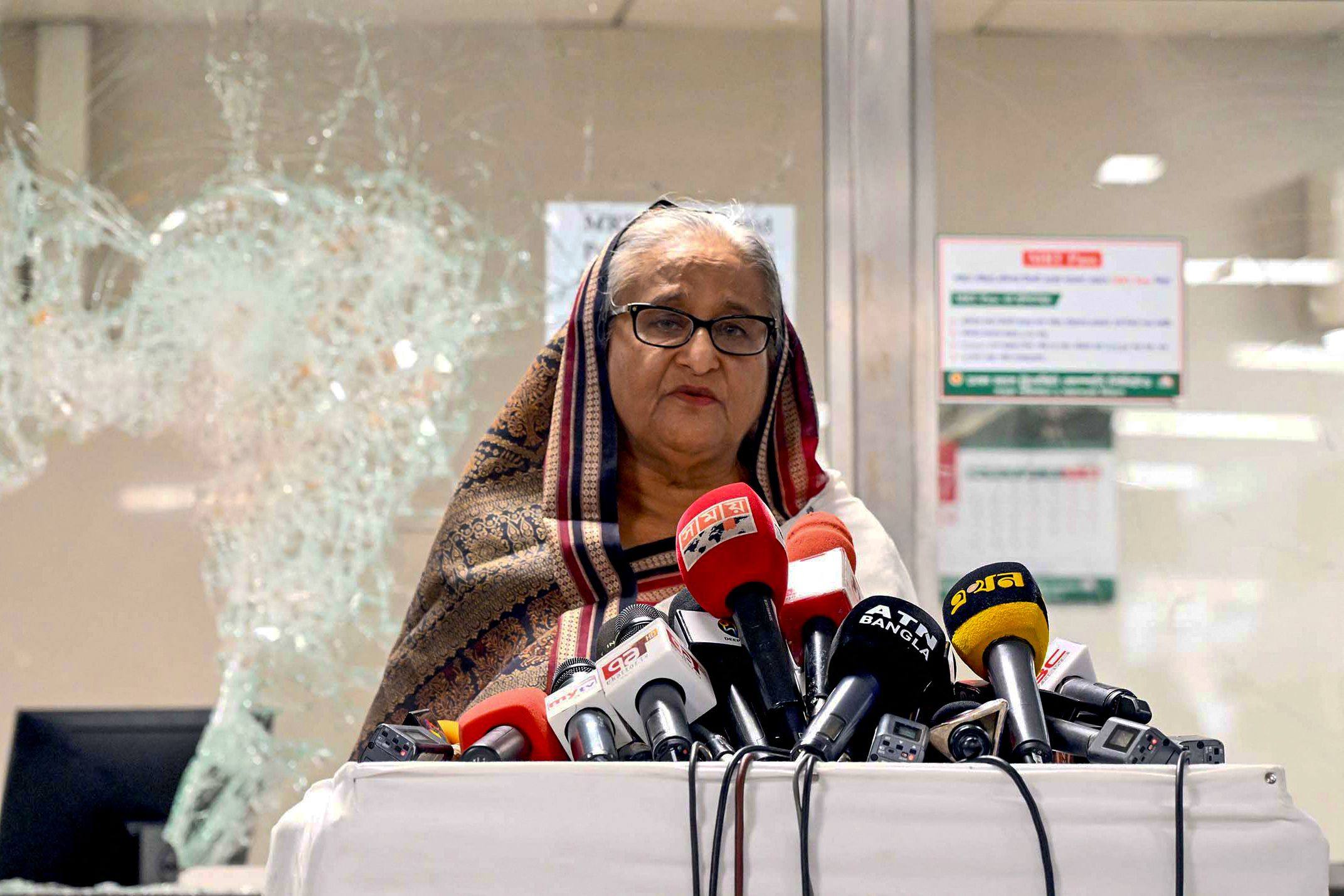 Bangladesh’s Prime Minister Sheikh Hasina addresses the media at a vandalised metro station in Mirpur, after the anti-quota protests in July 2024. Photo: Bangladesh Prime Minister’s Office / AFP