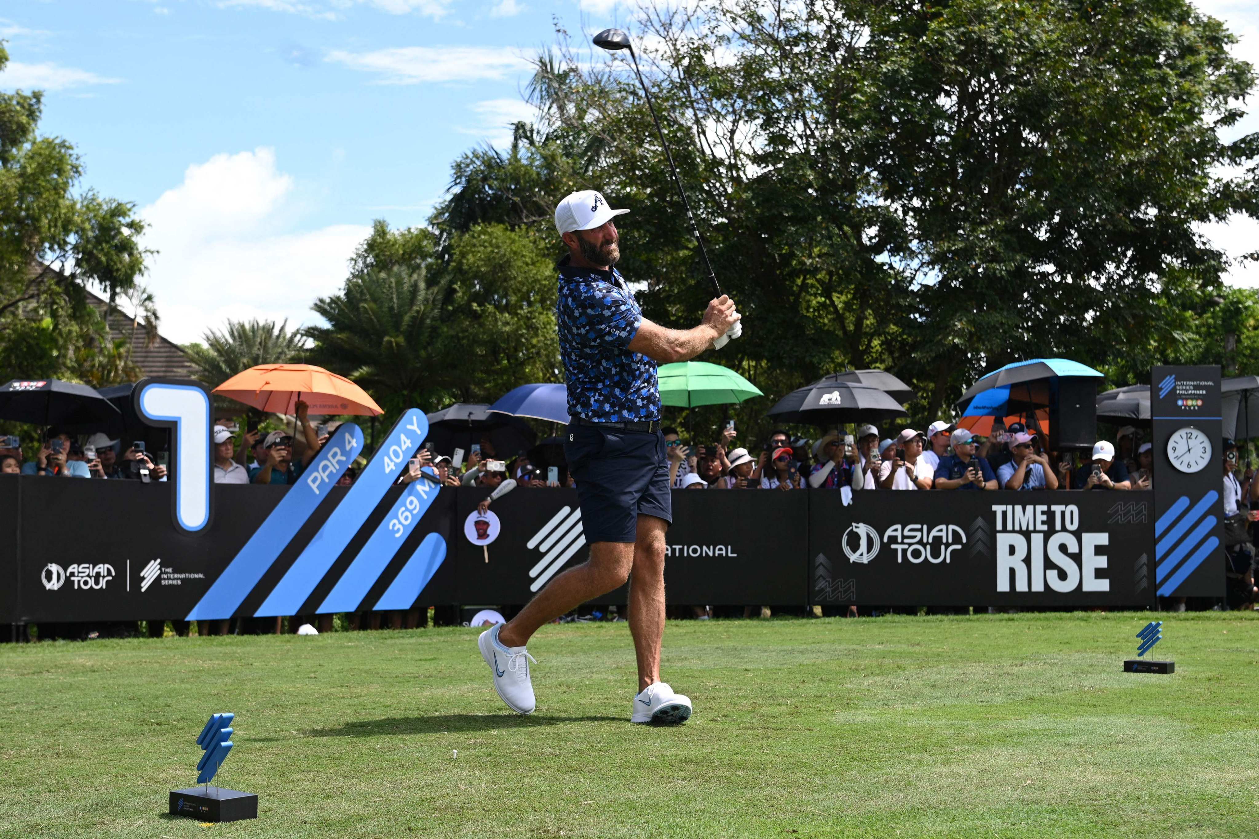 Dustin Johnson gets his International Series Philippines under way at Sta Elena Golf Club. Photo: AFP