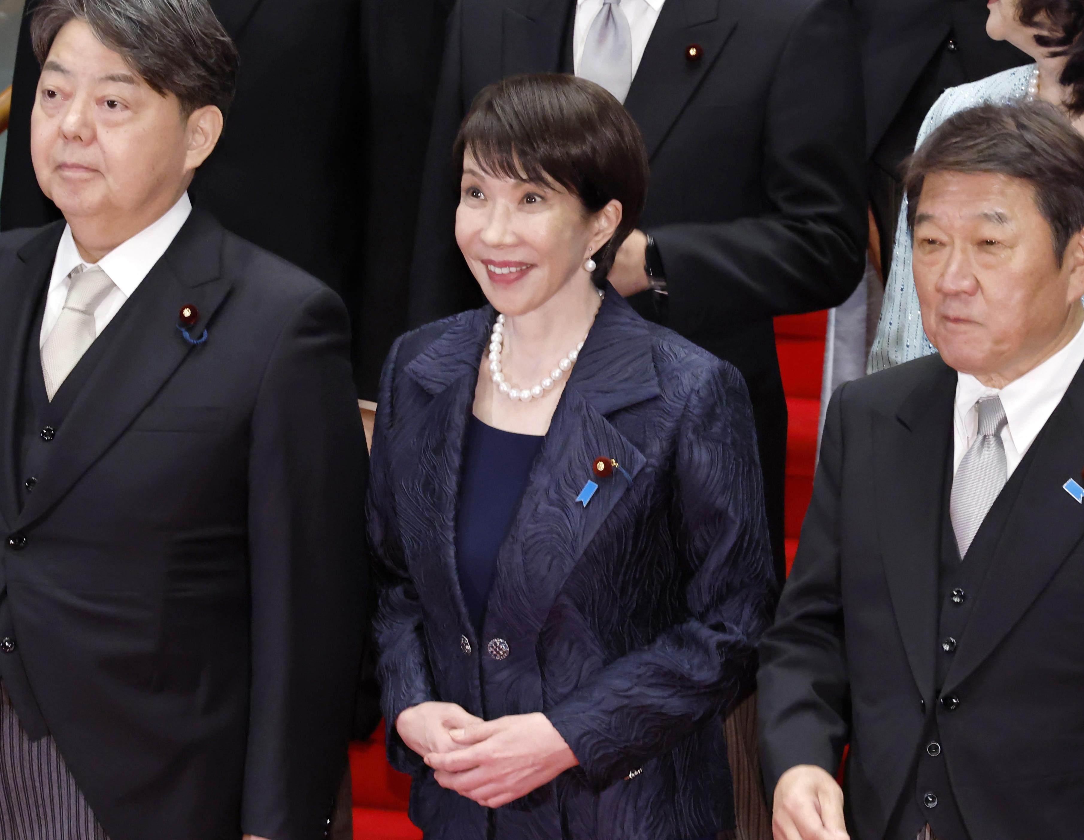 Japan’s new Prime Minister Sanae Takaichi (centre) poses for a group photo at her office in Tokyo with her cabinet following its first meeting on Tuesday. Photo: Kyodo