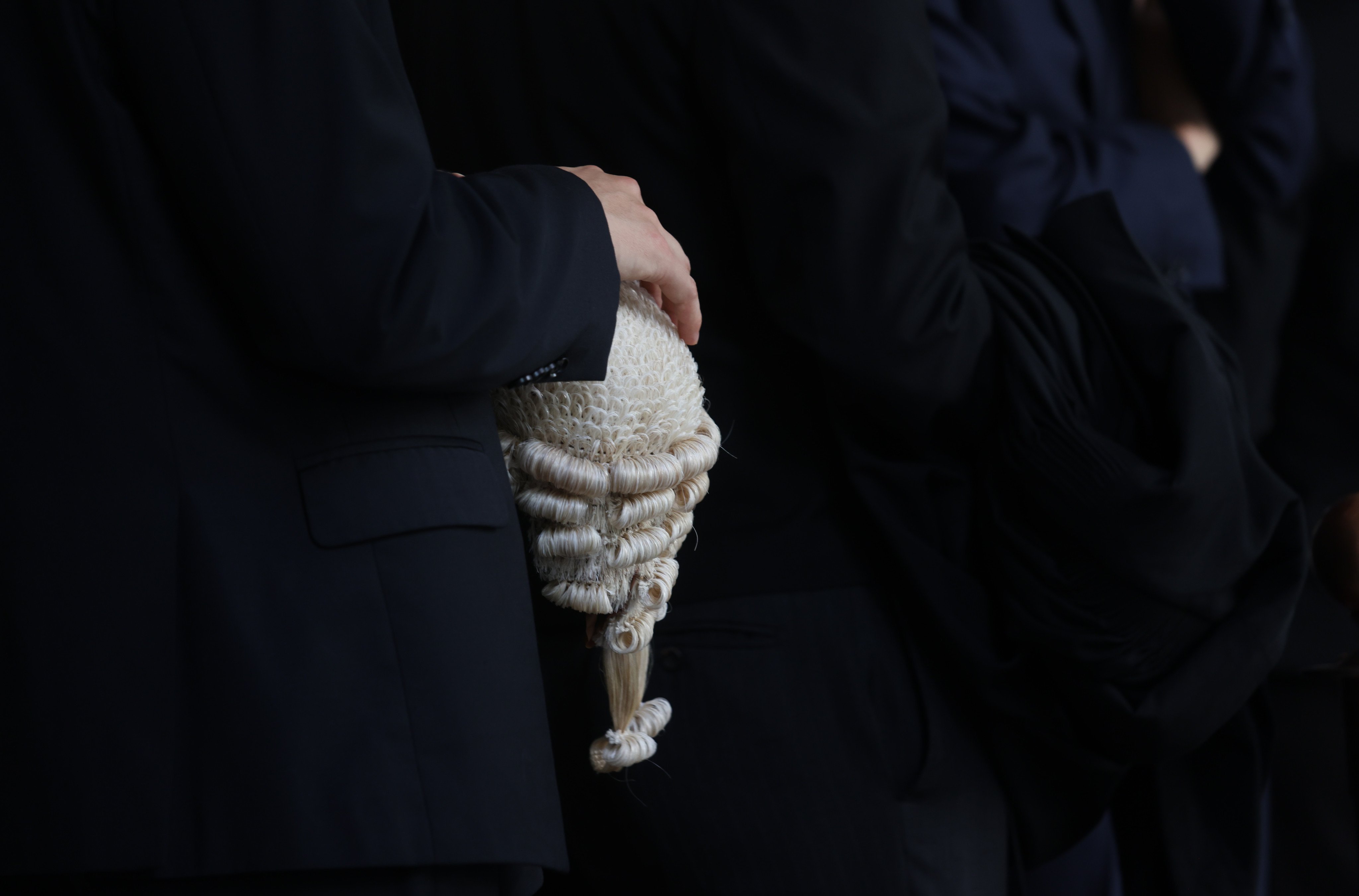 A barrister holds his wig at a senior counsel appointment ceremony, held at the High Court building in Central in May 2024. Photo: Yik Yeung-man.