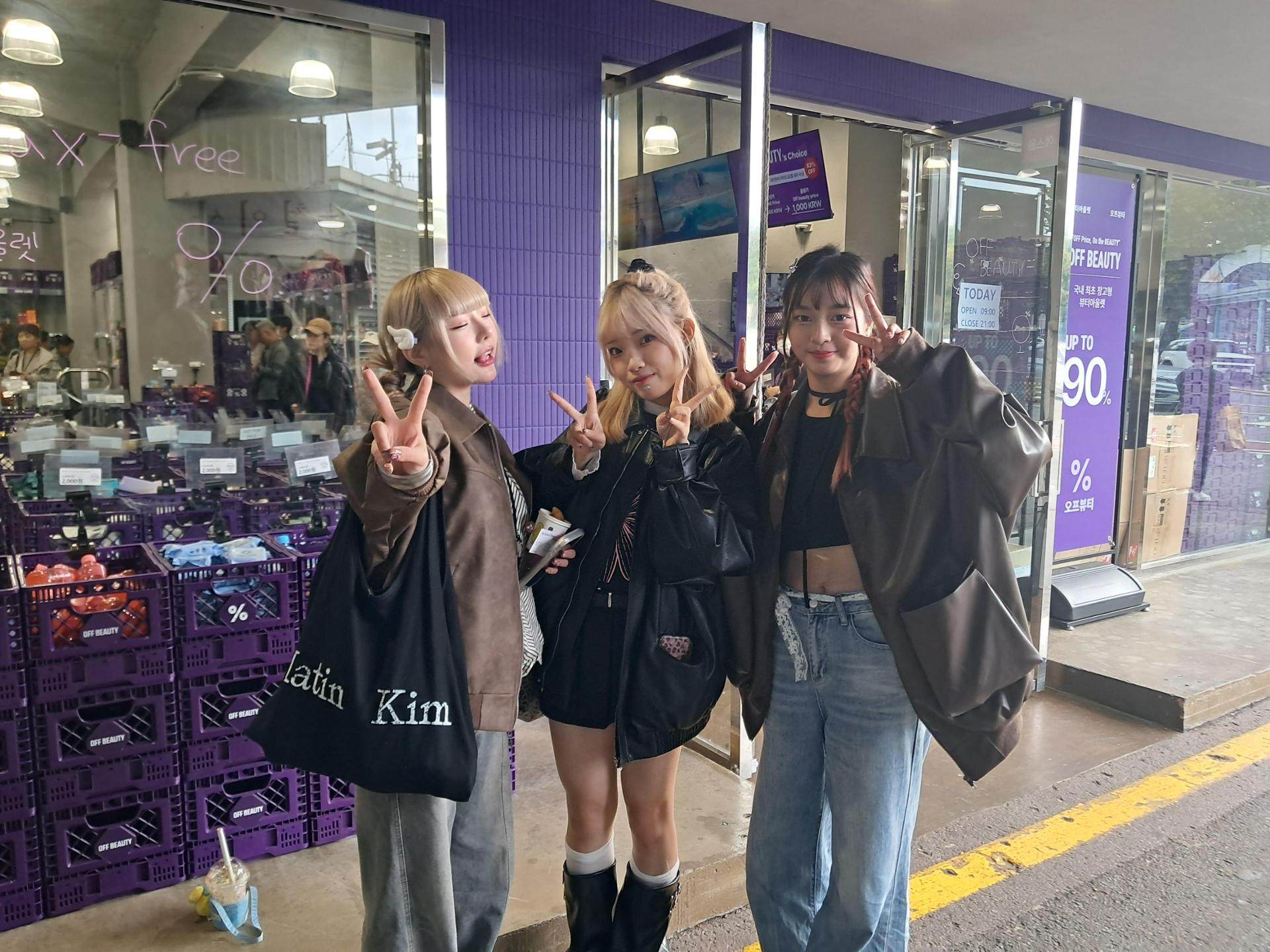 Three friends from Taiwan visit Gwangjang Market in Seoul. The market, which has well over 100 years of history, has begun to attract a new generation of shoppers. Photo: Korea Times