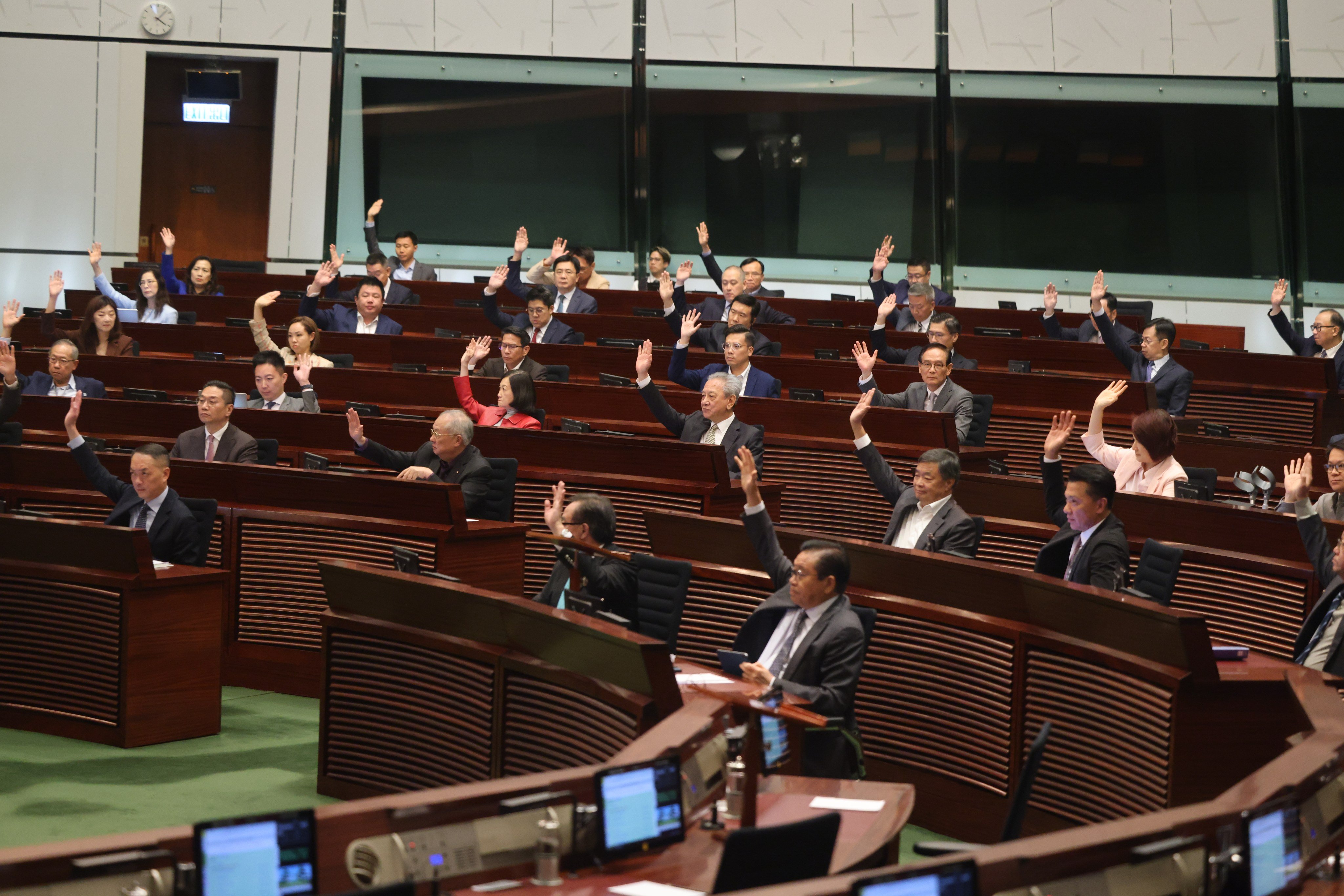Lawmakers attend one of the final sessions of the current term in the chamber of the Legislative Council in Admiralty on October 22. A number of lawmakers have announced they will not run in the coming Legco election. Photo: Nora Tam