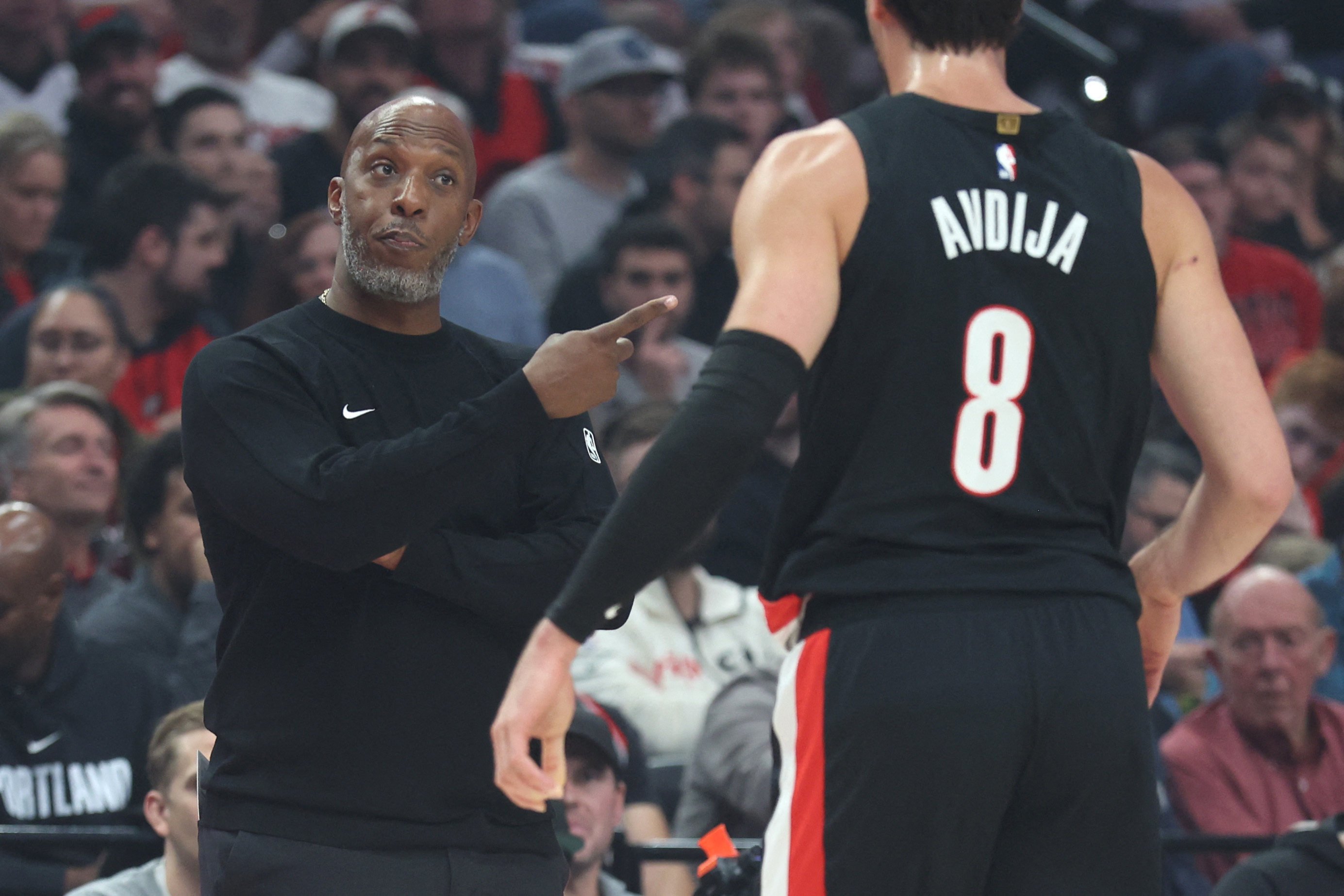Portland Trail Blazers head coach Chauncey Billups talks with forward Deni Avdija during Wednesday’s game against the Minnesota Timberwolves. Photo: Reuters