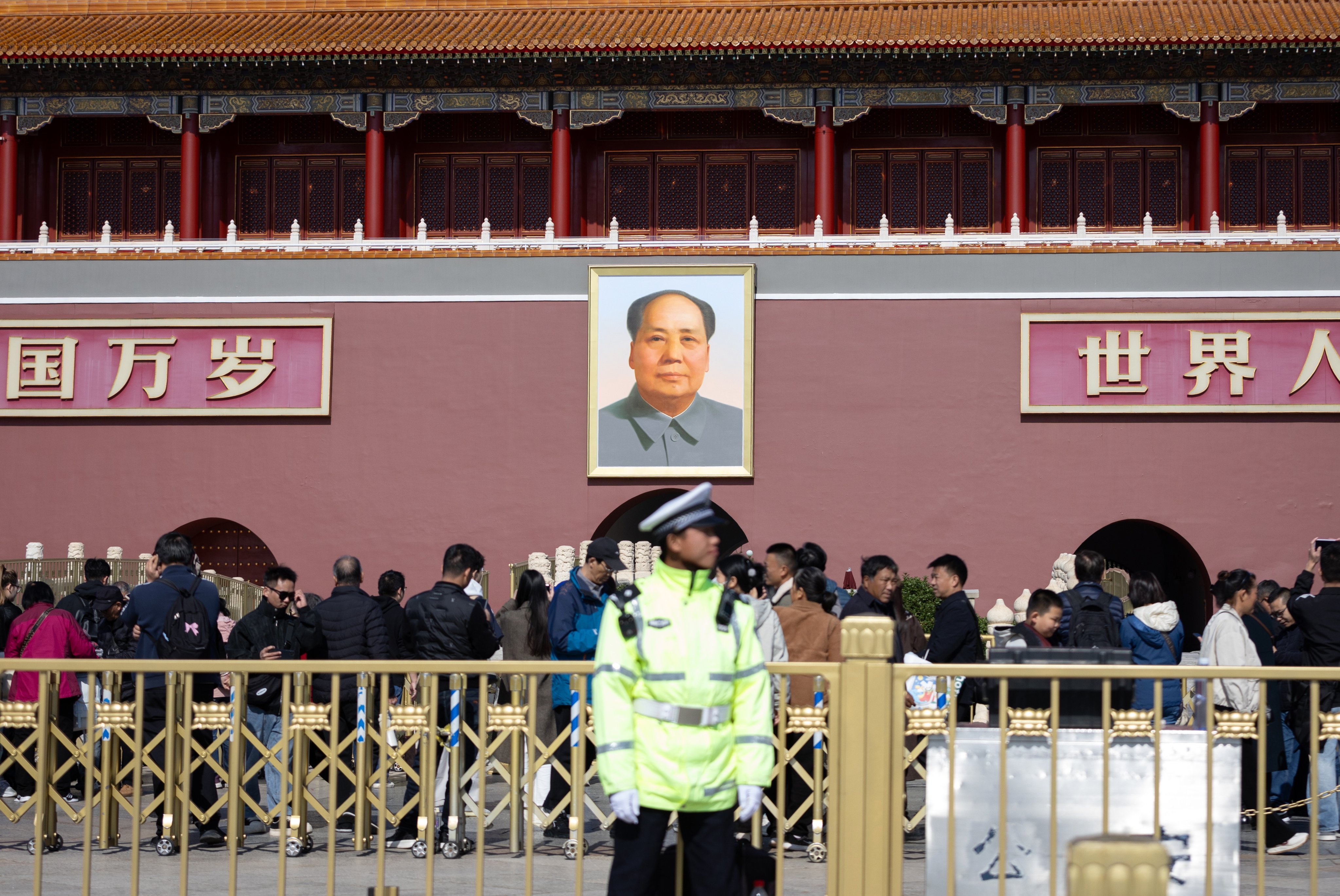 A police officer stands guard at Tiananmen Square in Beijing. File photo: EPA