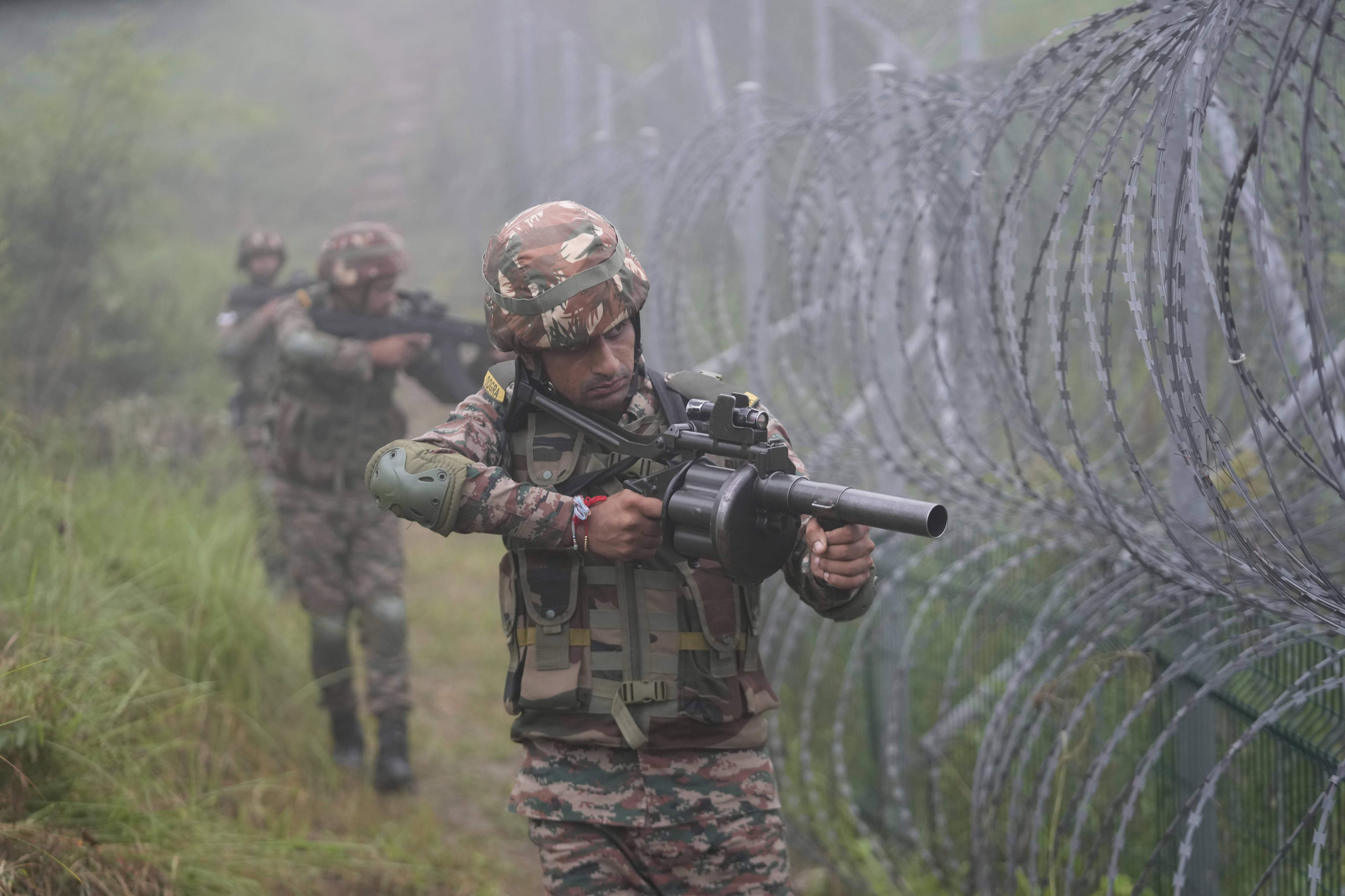 Indian army soldiers take part in a military drill near the Line of Control that divides India and Pakistan at Sunderbani, Jammu and Kashmir, India, in August. Photo: AP