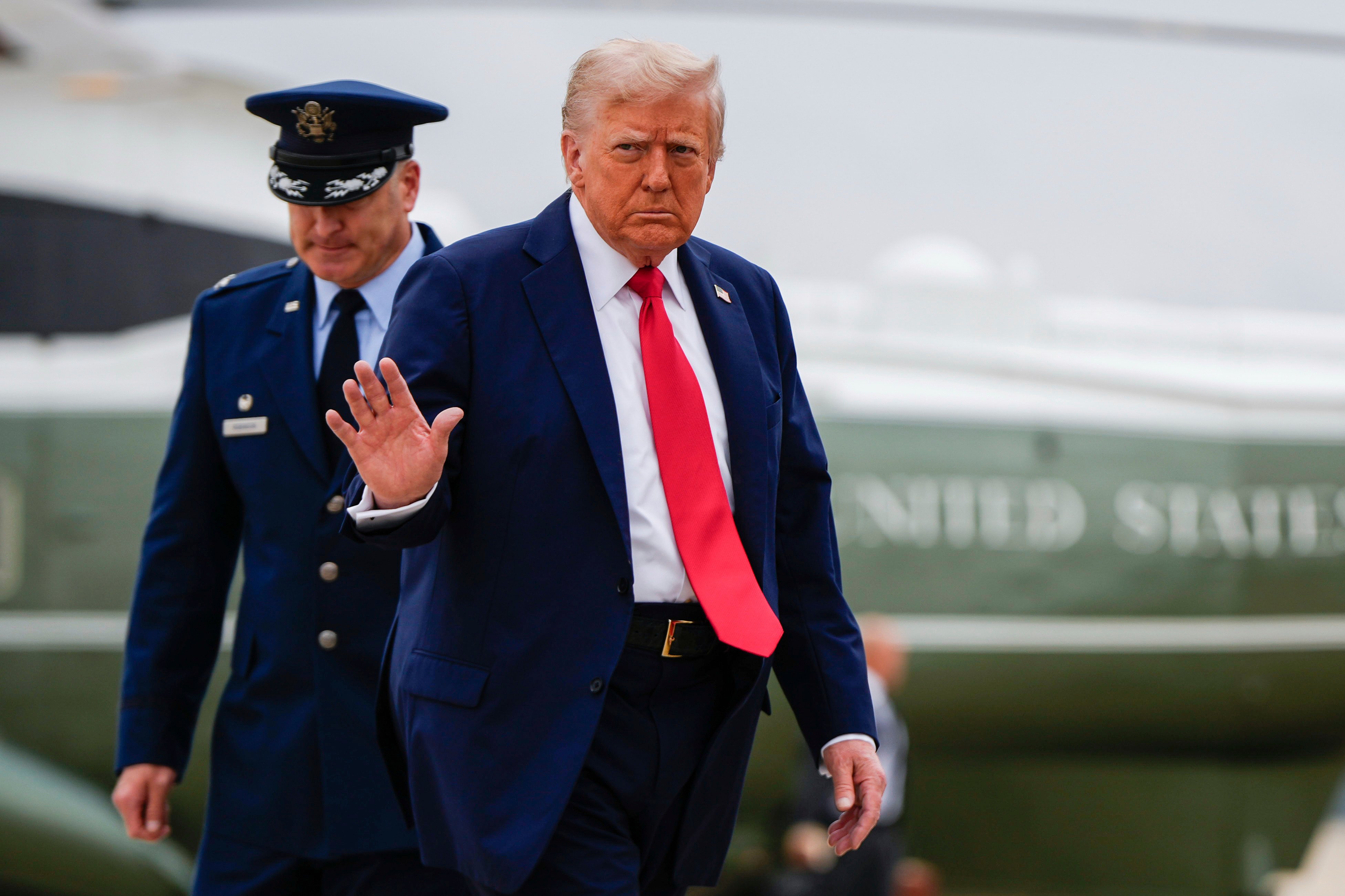 US President Donald Trump waves goodbye as he walks to board Air Force One last month. Photo: AP