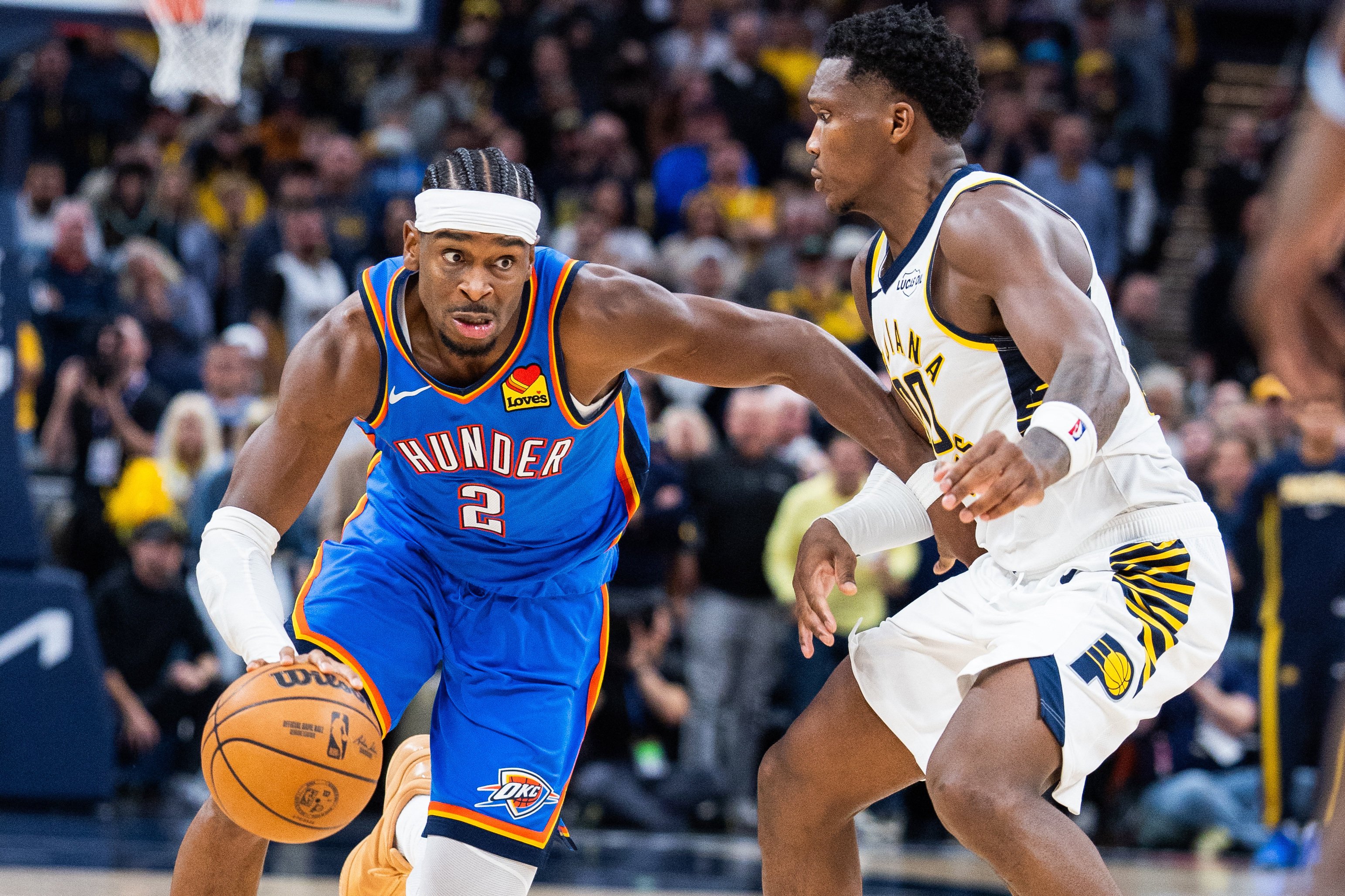 Oklahoma City Thunder guard Shai Gilgeous-Alexander (left) dribbles the ball past Indiana Pacers guard Bennedict Mathurin. Photo: Reuters