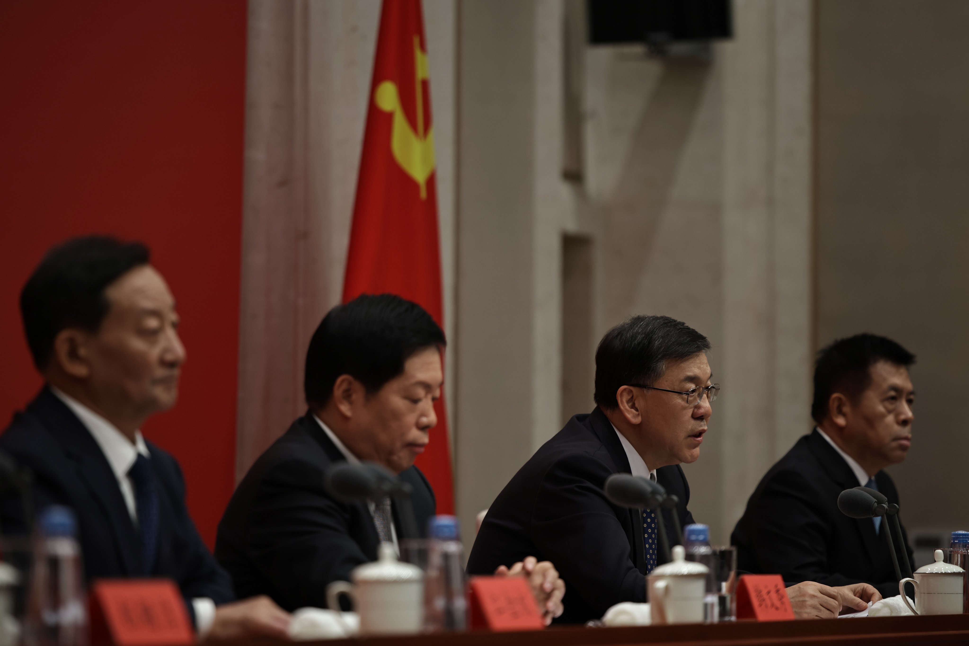 Senior officials held a press conference following the fourth plenum of the Central Committee of China’s ruling Communist Party. Photo: EPA