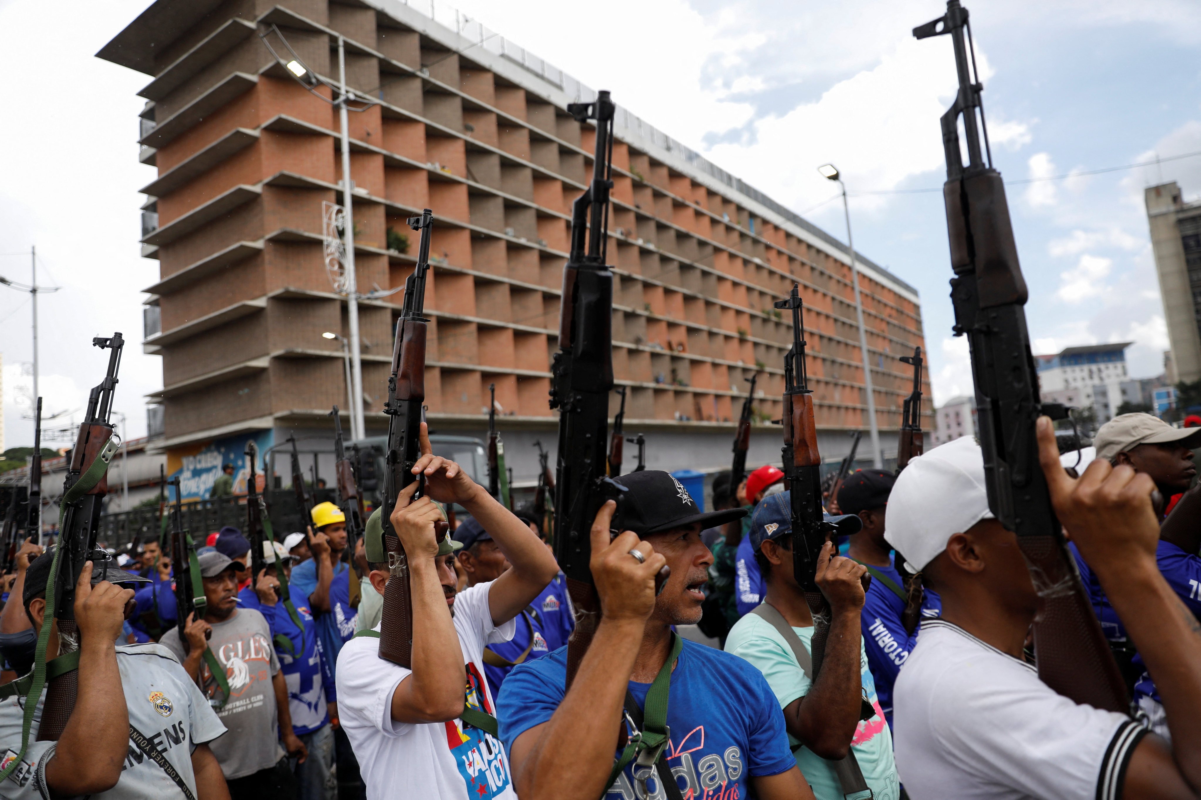 Men in Caracas hold weapons during a rally of the Bolivarian National Militia in support of Venezuelan President Nicolas Maduro, amid rising tensions with the US. Photo: Reuters