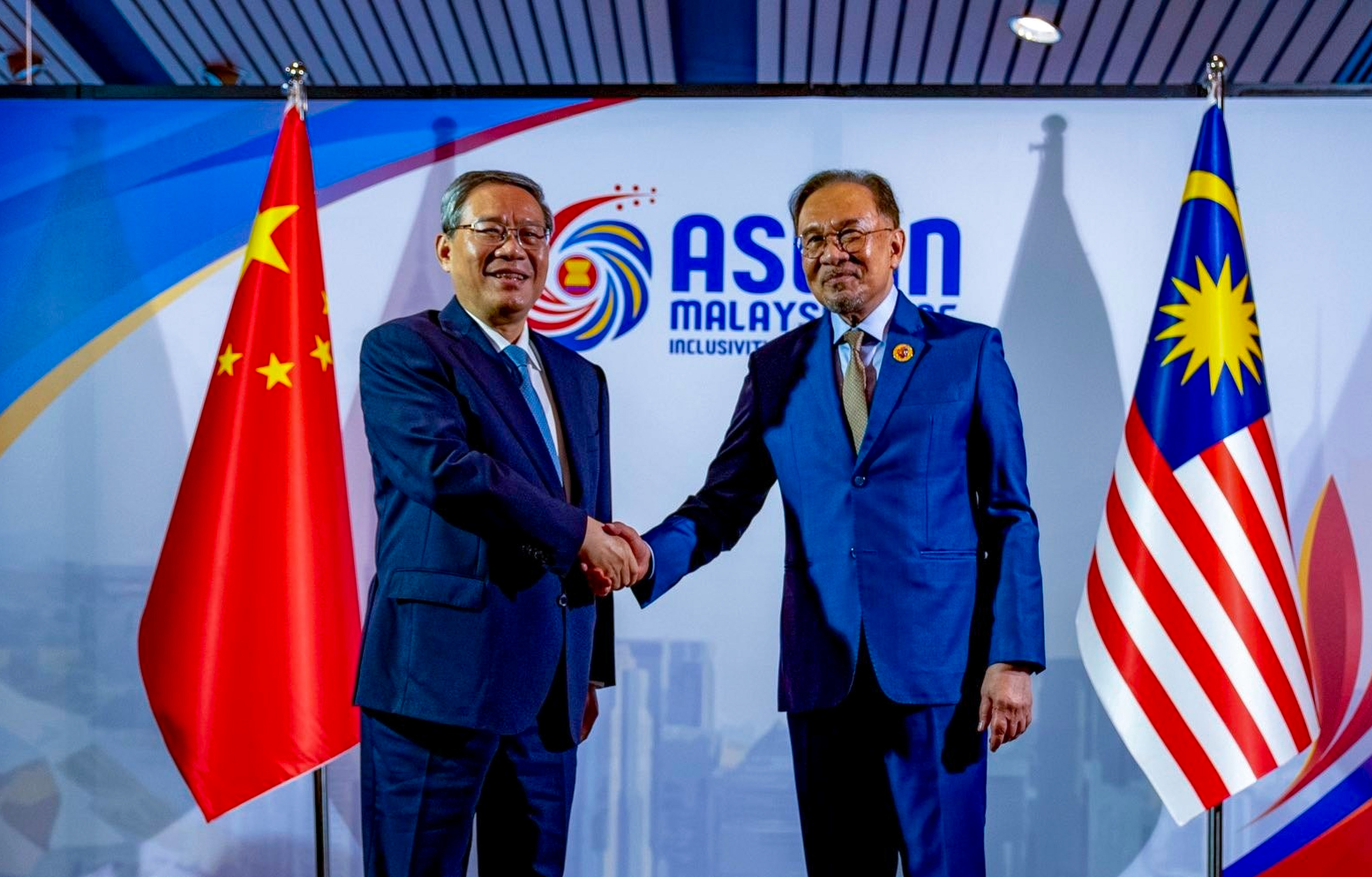 China’s Premier Li Qiang (left) shakes hands with Malaysia’s Prime Minister Anwar Ibrahim, the 2025 Asean chair, on the sidelines of an Asean summit in May. Photo: Handout