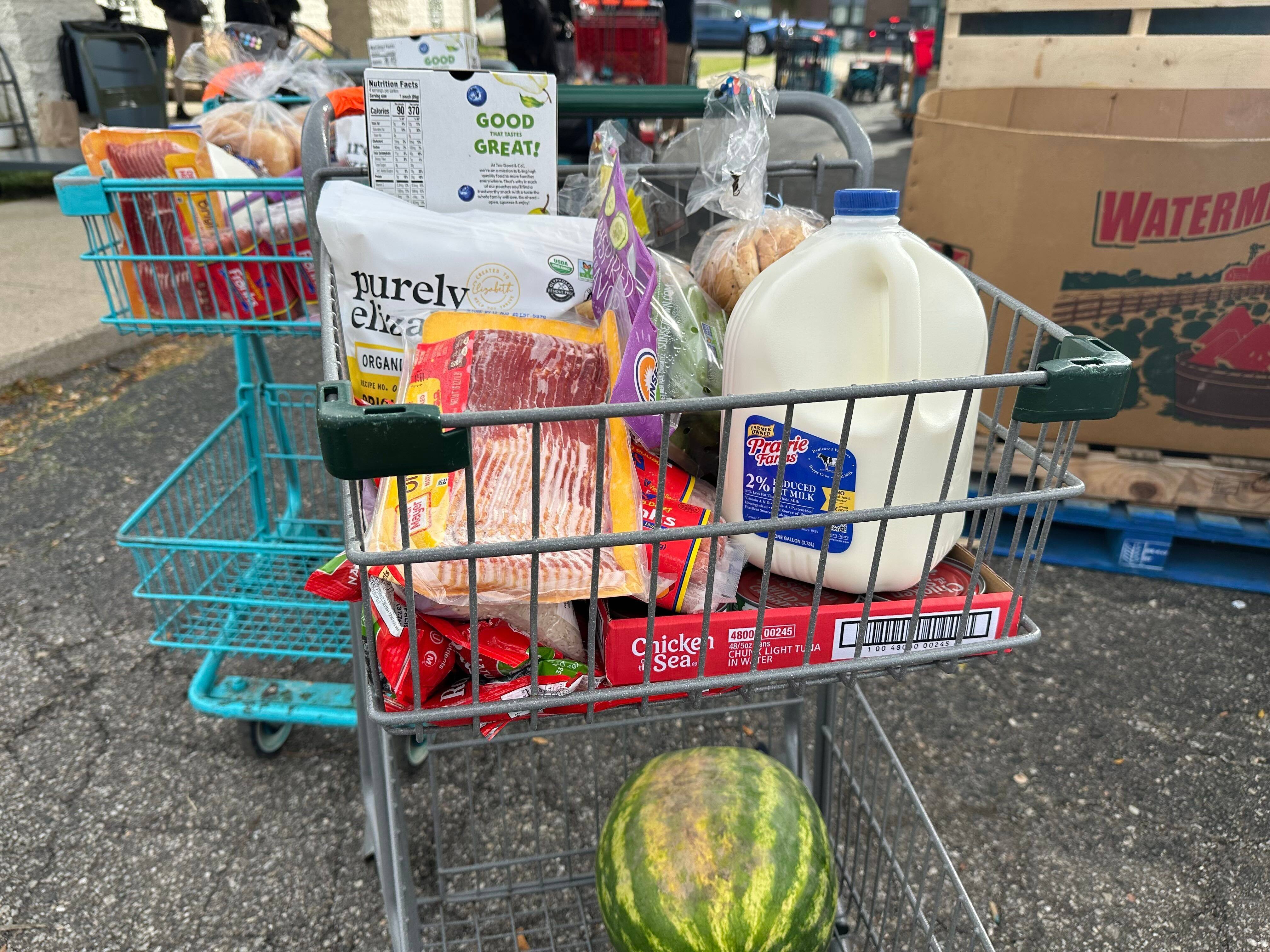 Food items in a shopping cart at a distribution event held in Pontiac, Michigan on Friday. Photo: AP