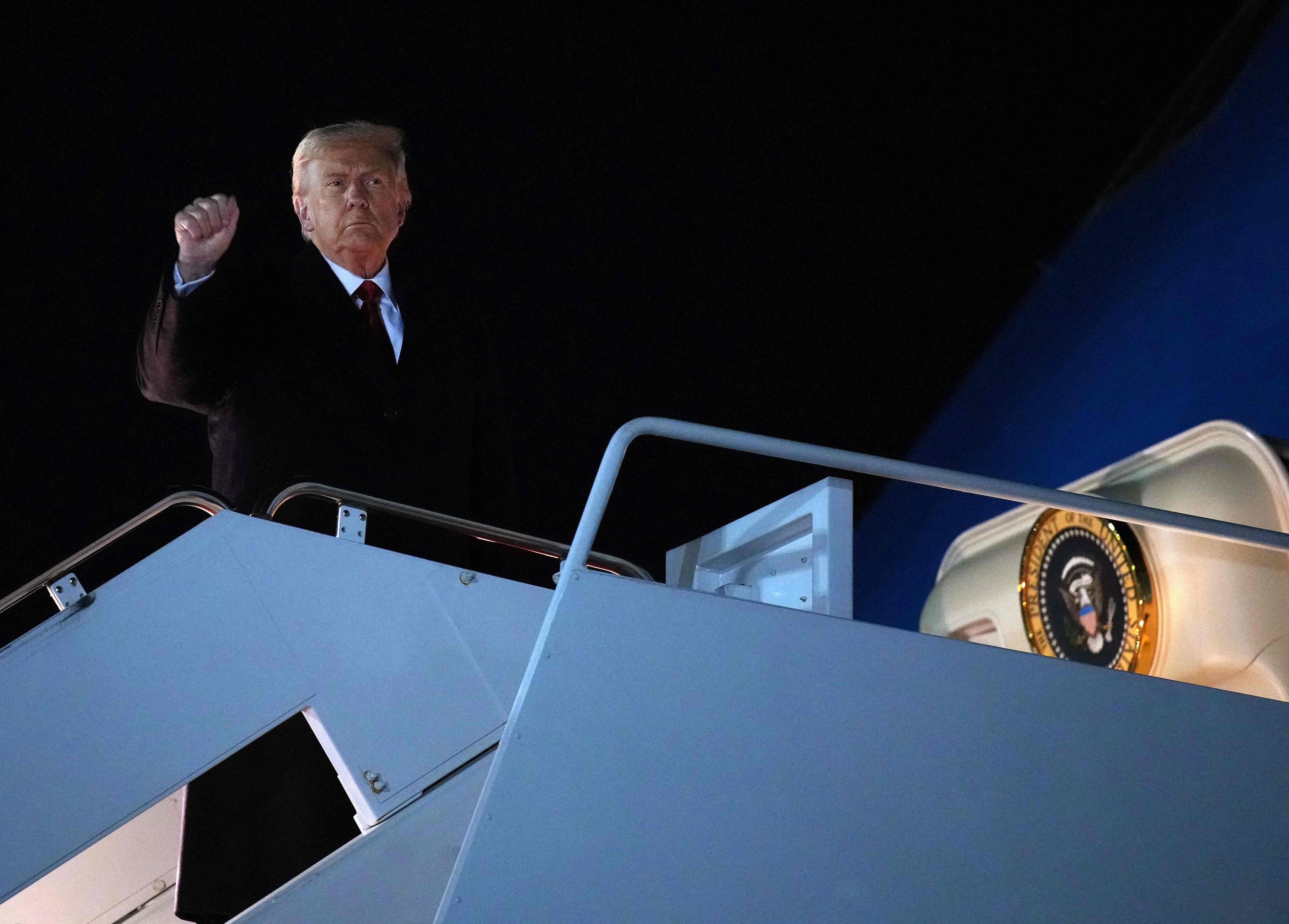 US President Donald Trump boards Air Force One on Friday at Joint Base Andrews, Maryland as he travels to Malaysia for the Asean summit and other meetings. Photo: Getty Images via AFP