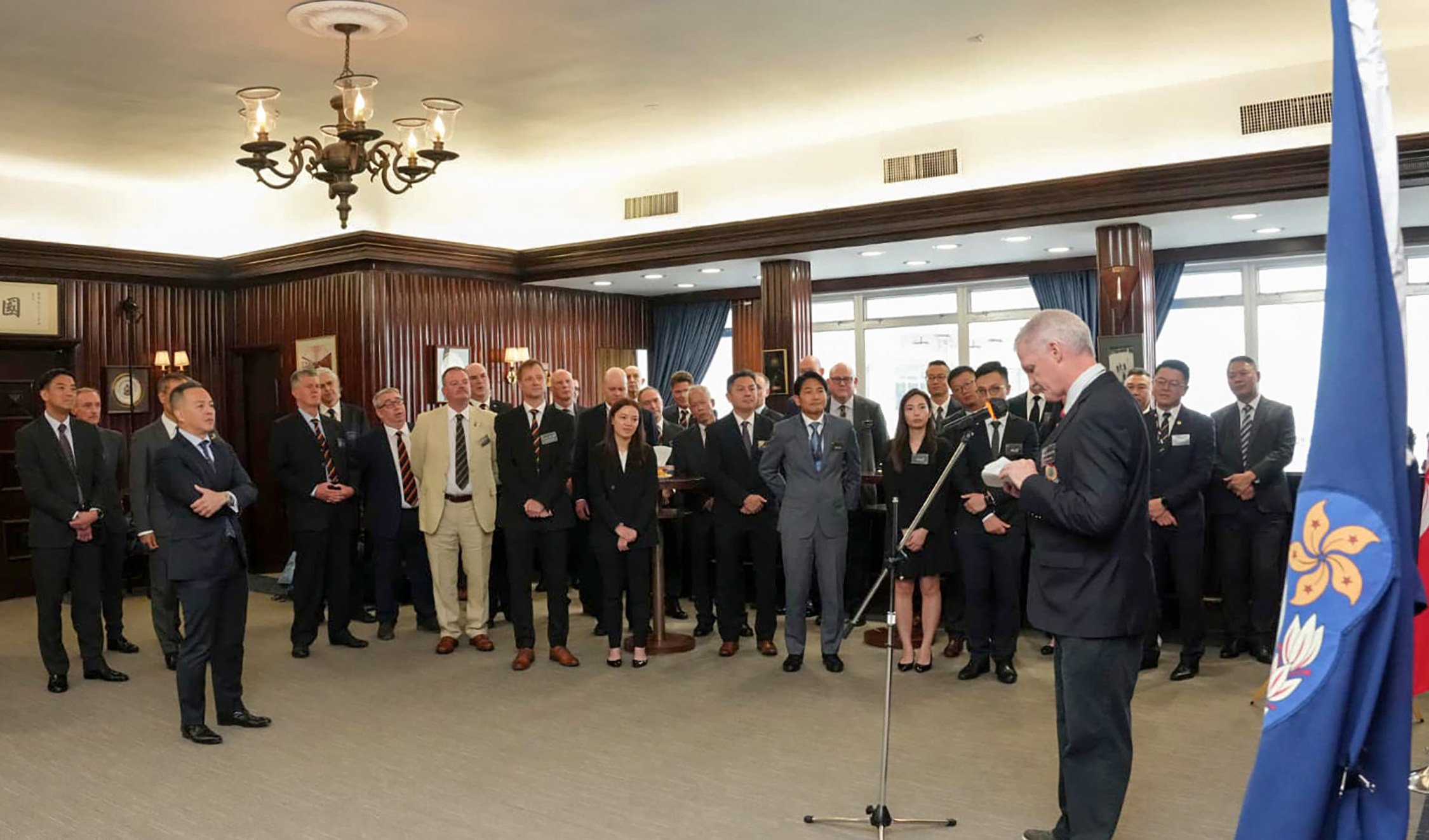 Overseas Inspectors Association chairman Tobi Lothian delivers a speech at the disbandment ceremony on Friday. Photo: Handout