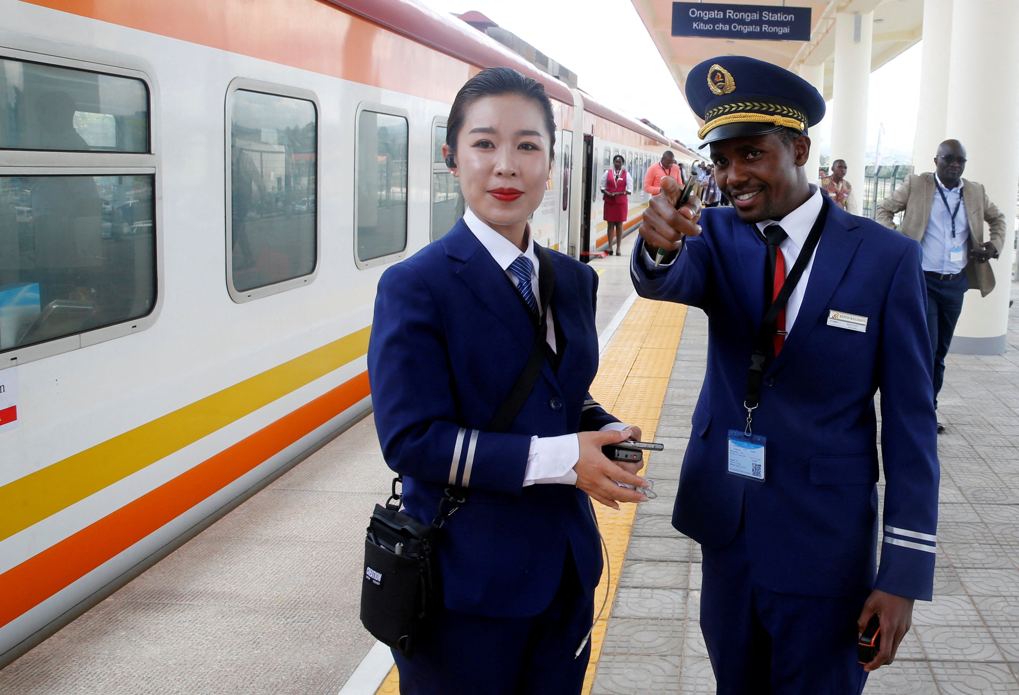 Kenya Railways attendants talk next to a train along the Standard Gauge Railway line constructed by the China Road and Bridge Corporation and financed by the Chinese government in Ongata Rongai, Kenya, on October 16, 2019. China’s extensive investment and trade presence in Africa has driven industrial growth and enhanced connectivity across the continent. Photo: Reuters
