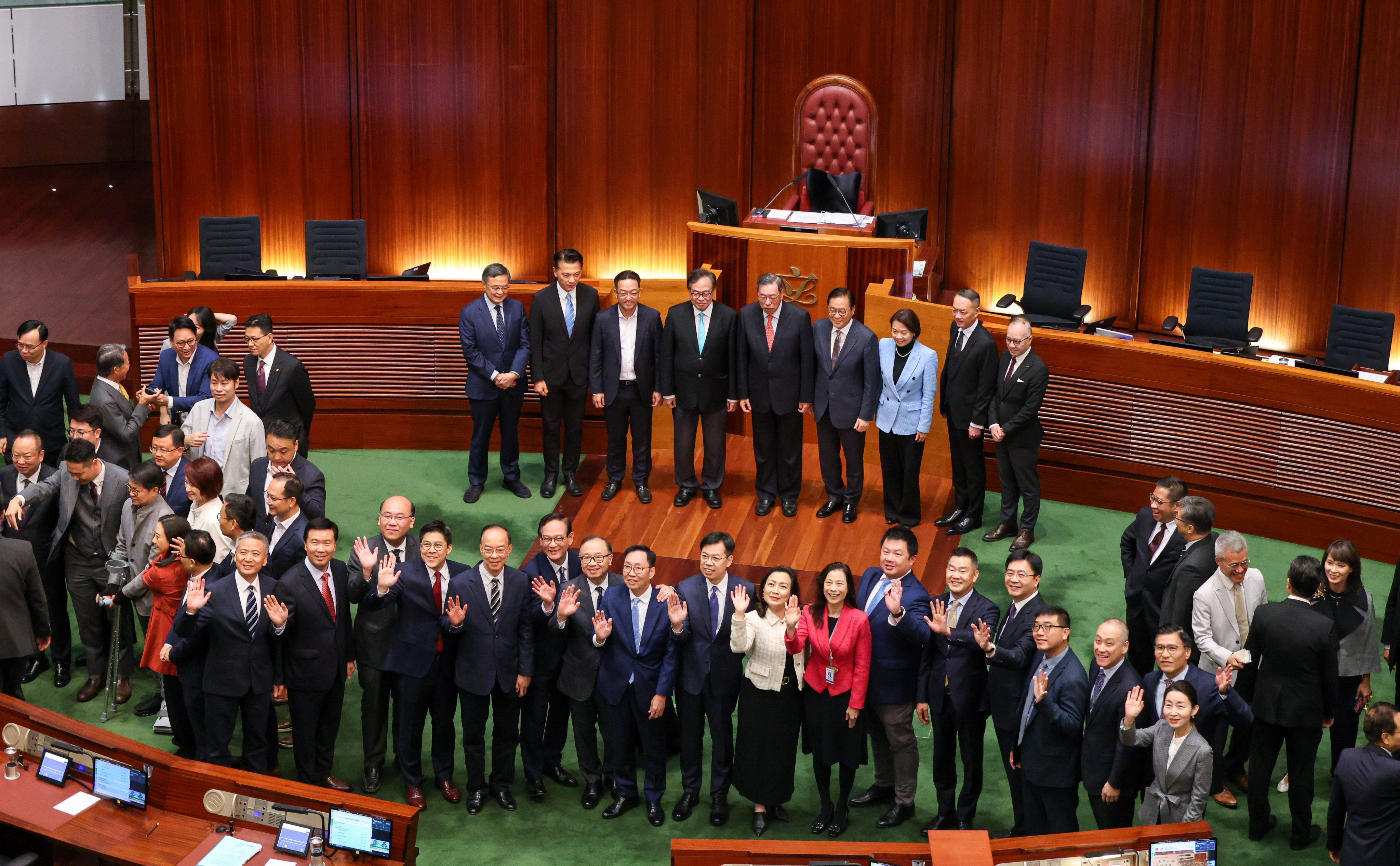 Lawmakers gather for photos with outgoing Legco president Andrew Leung Kwan-yuen after the end-of-term final meeting in the Legco chamber on October 23. Photo: Nora Tam
