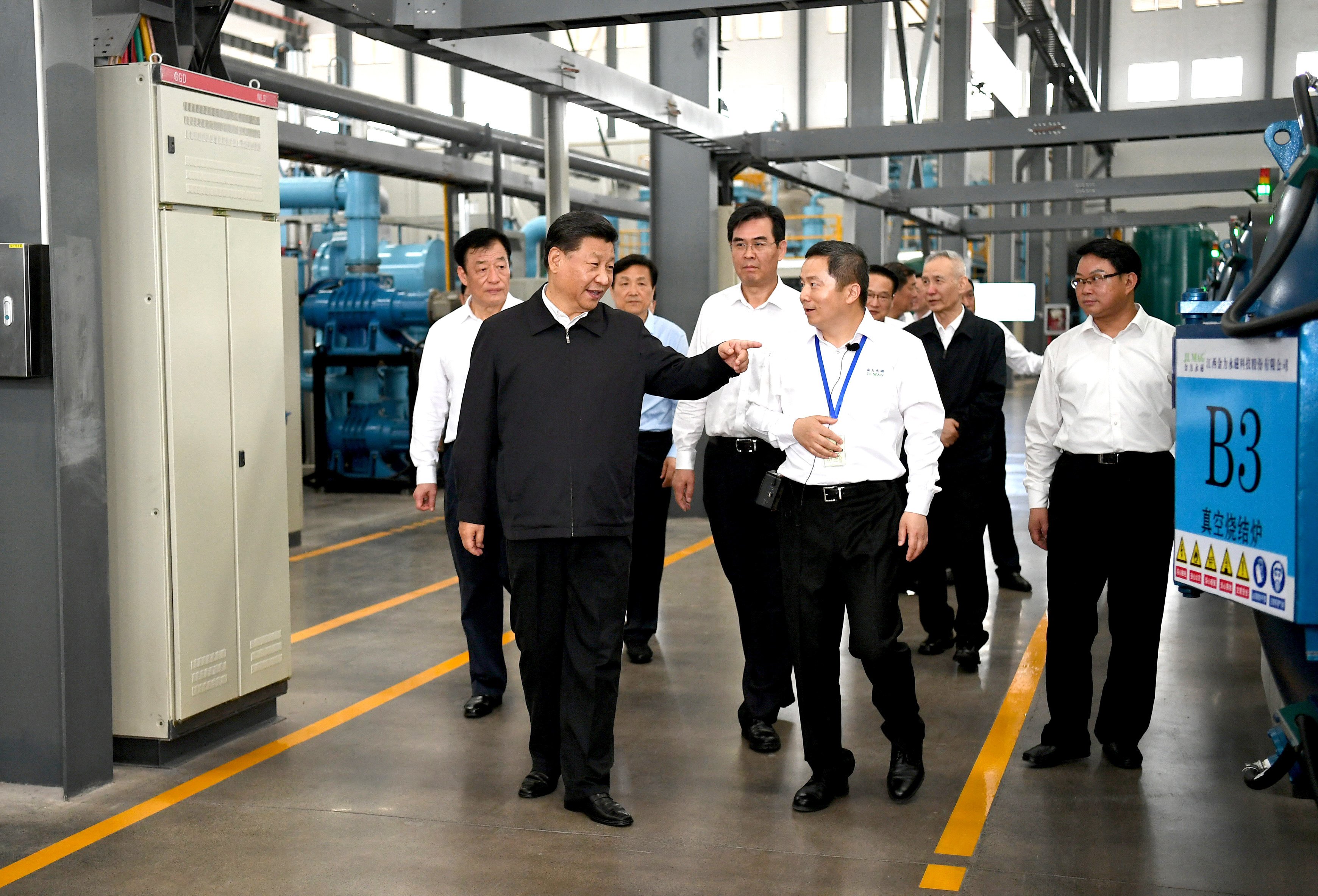 President Xi Jinping learns about the rare earth production process at a facility in Ganzhou, Jiangxi province on May 20, 2019. Photo: Xinhua