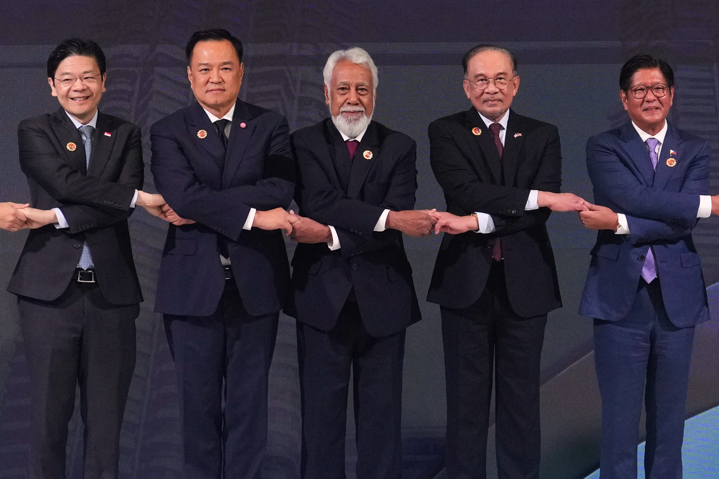 From left, Singapore’s Prime Minister Lawrence Wong, Thailand’s PM Anutin Charnvirakul, East Timor’s PM Kay Rala Xanana Gusmao, Malaysia’s PM Anwar Ibrahim, Philippine President Ferdinand Marcos Jnr pose for a picture during the 47th Asean summit in Kuala Lumpur on Sunday. Photo: AP