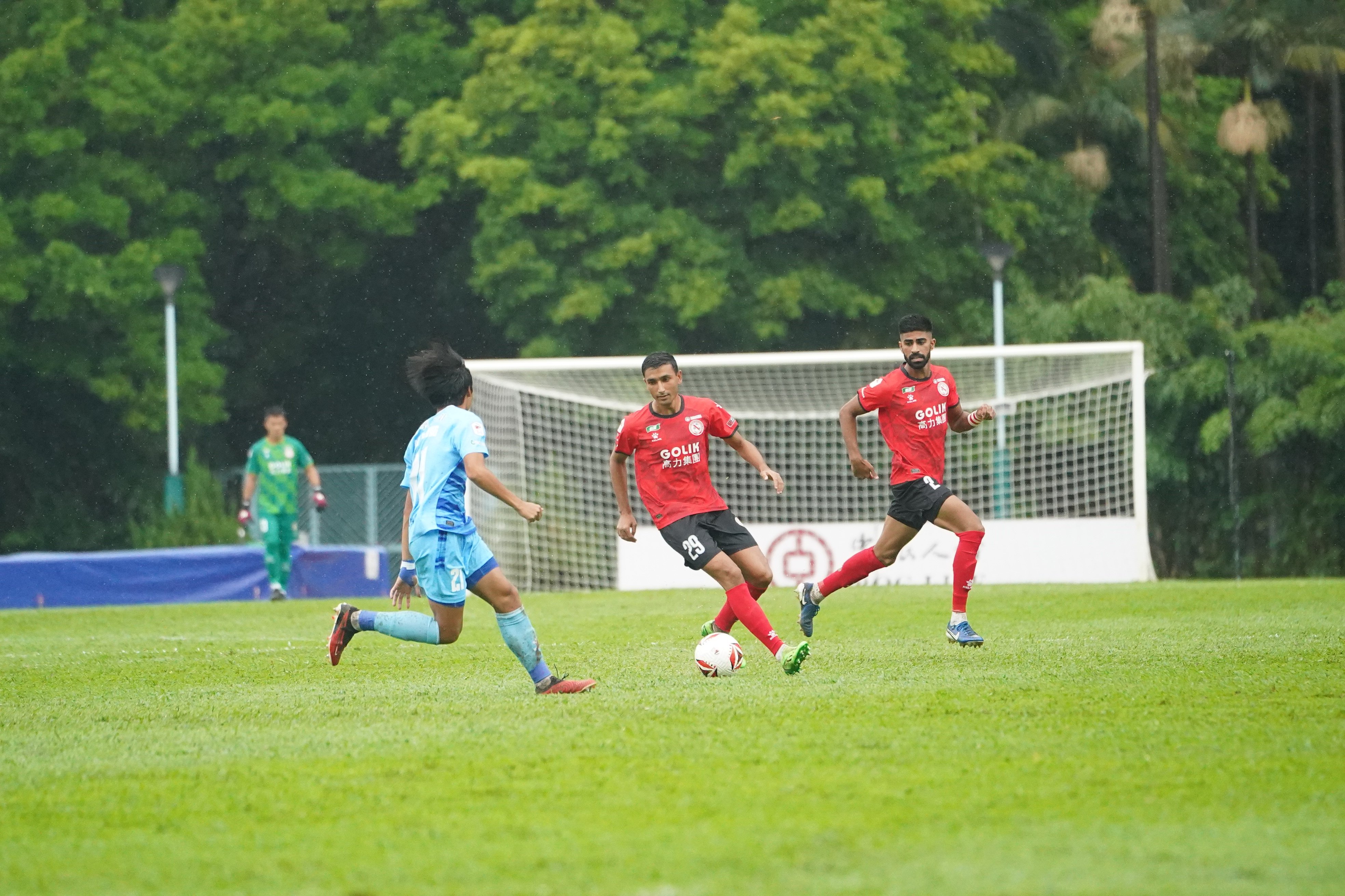 Jahangir Khan (middle) is enjoying his season as North District sit perched at the top of the Premier League. Photo: North District FC