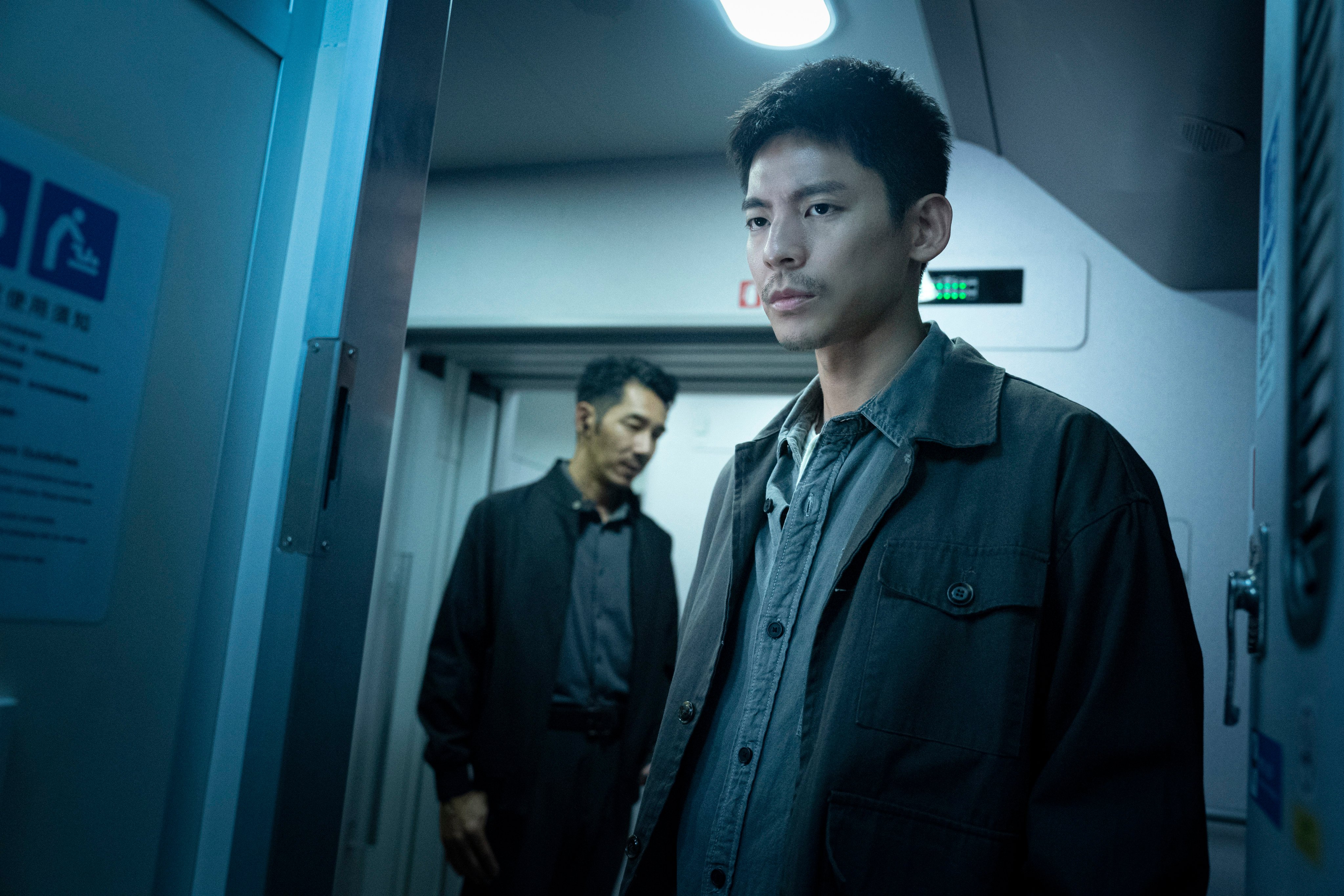 Austin Lin (front) and Lee Lee-zen in a still from Taiwanese thriller 96 Minutes (category IIB, Mandarin), directed by Hung Tzu-hsuan. Vivian Sung and Jacob Wang co-star.