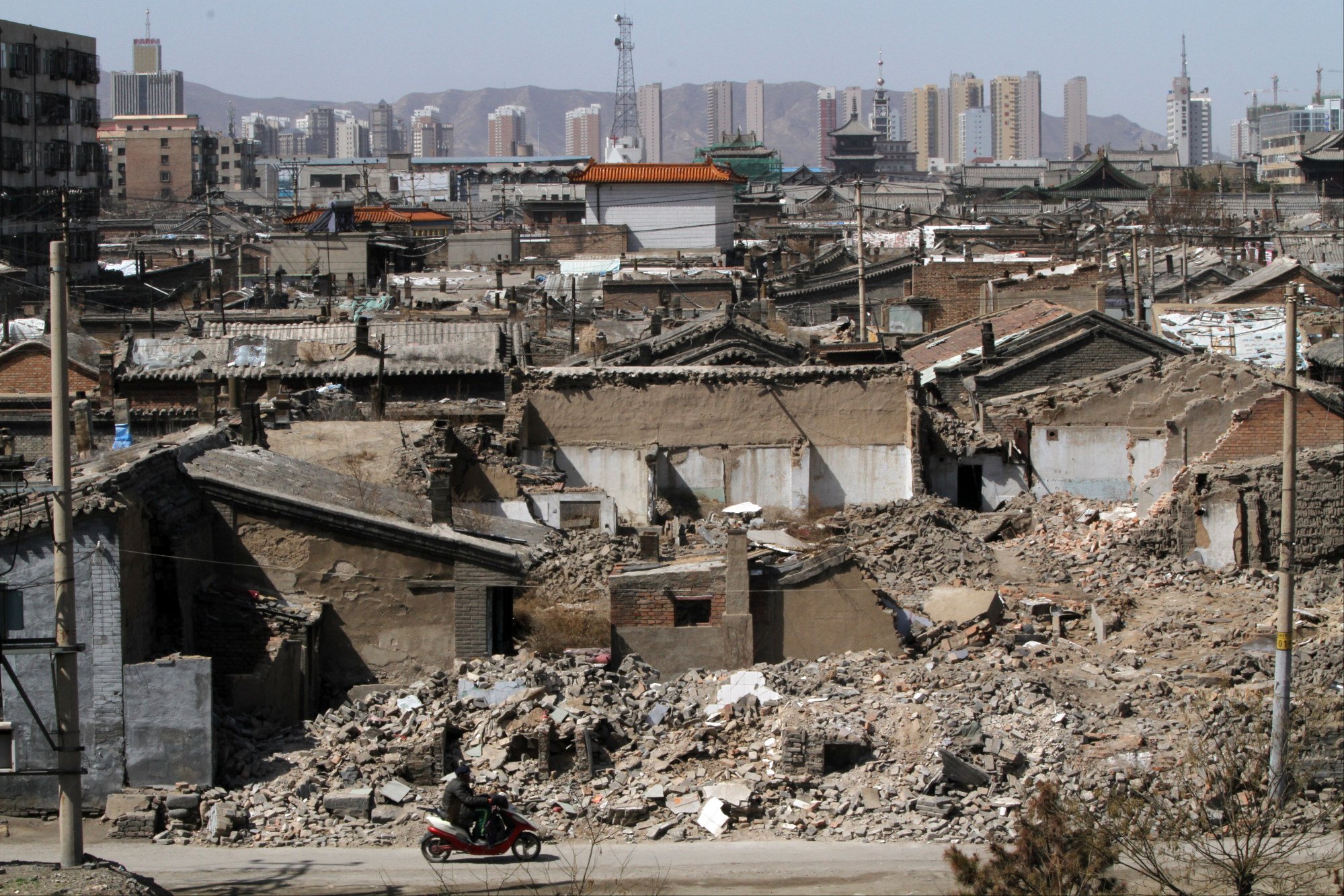 In this 2016 image of Datong city, Shanxi province, residential houses are seen demolished as part of the local government’s efforts to rebuild large portions of the city with traditional-style homes and attract more tourists. Photo: Simon Song In this 2016 image of Datong city, Shanxi province, residential houses are seen demolished as part of the local government’s efforts to rebuild large portions of the city with traditional-style homes and attract more tourists. Photo: Simon Song