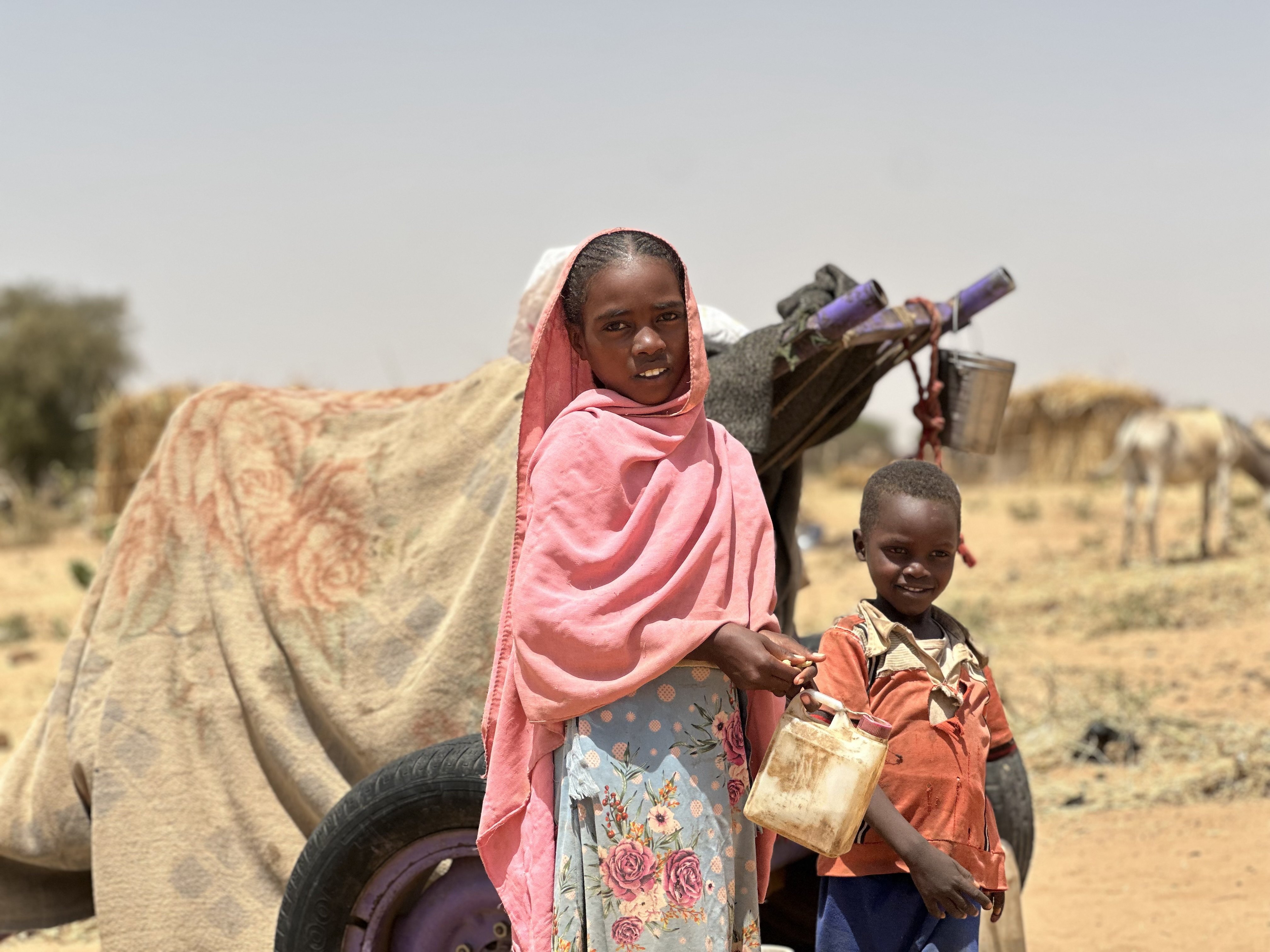 Sudanese children, who fled from a camp for internally displaced persons, rest in April while on their way to another camp amid their country’s devastating civil war. Photo: EPA-EFE
