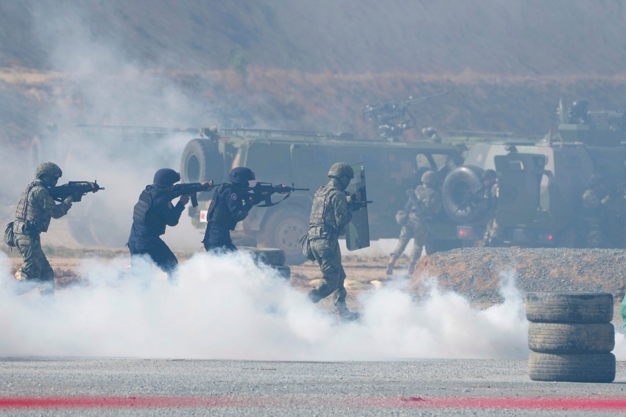 Chinese and Cambodian military personnel participate in a military exercise in a village in Kampong Chhnang province, Cambodia, in May last year. Photo: AP Chinese and Cambodian military personnel participate in a military exercise in a village in Kampong Chhnang province, Cambodia, in May last year. Photo: AP
