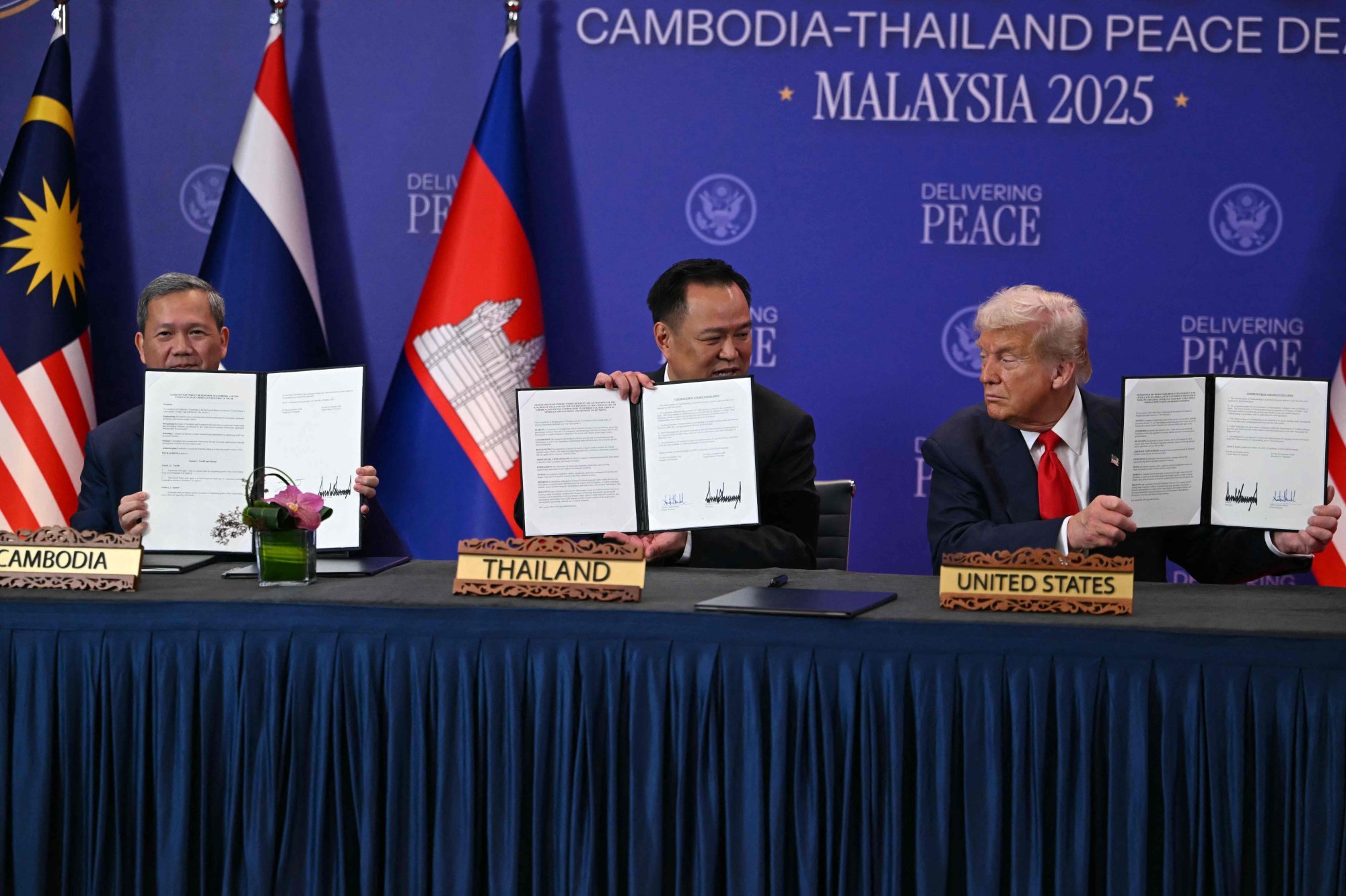 US President Donald Trump, Cambodia’s Prime Minister Hun Manet and Thailand’s Prime Minister Anutin Charnvirakul attend the signing of a ceasefire agreement in Kuala Lumpur on Sunday. Photo: AFP US President Donald Trump, Cambodia’s Prime Minister Hun Manet and Thailand’s Prime Minister Anutin Charnvirakul attend the signing of a ceasefire agreement in Kuala Lumpur on Sunday. Photo: AFP