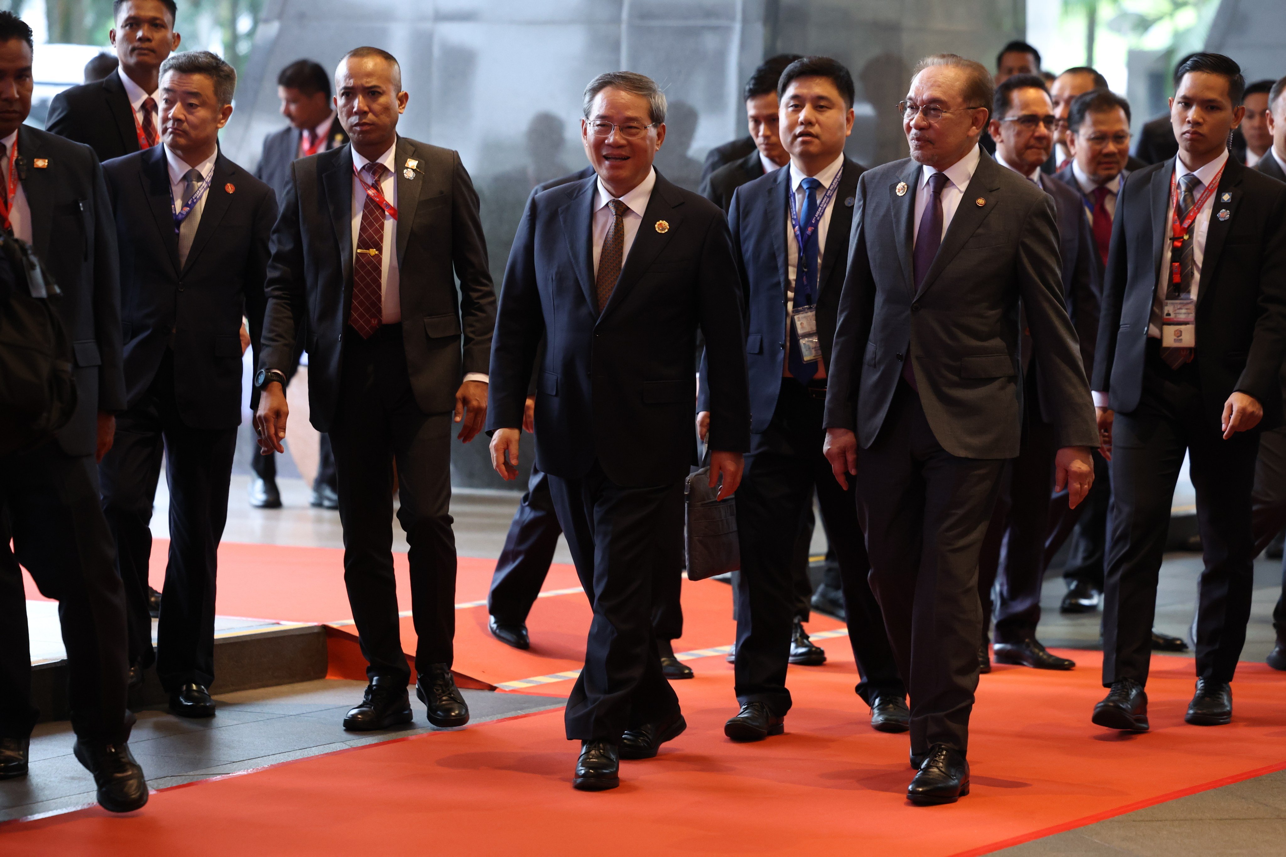 China’s Premier Li Qiang, front left, and Malaysia’s Prime Minister Anwar Ibrahim, front right, ahead of the signing of an upgraded China-Asean free trade agreement. Photo: AP