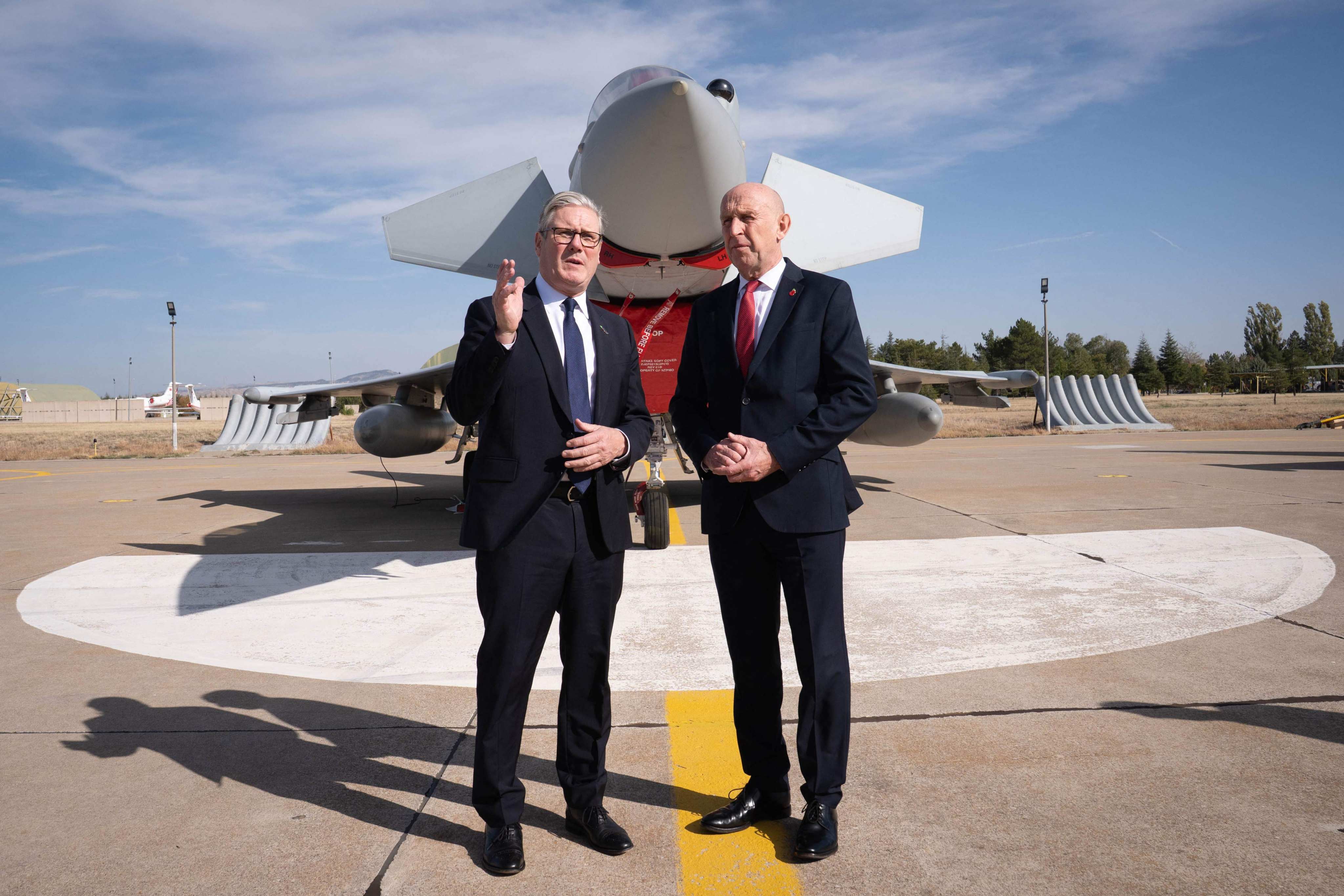 Britain’s Prime Minister Keir Starmer and Britain’s Defence Secretary John Healey in front of a UK Typhoon fighter jet at Tusas airbase in Ankara, Turkey. Photo: AFP