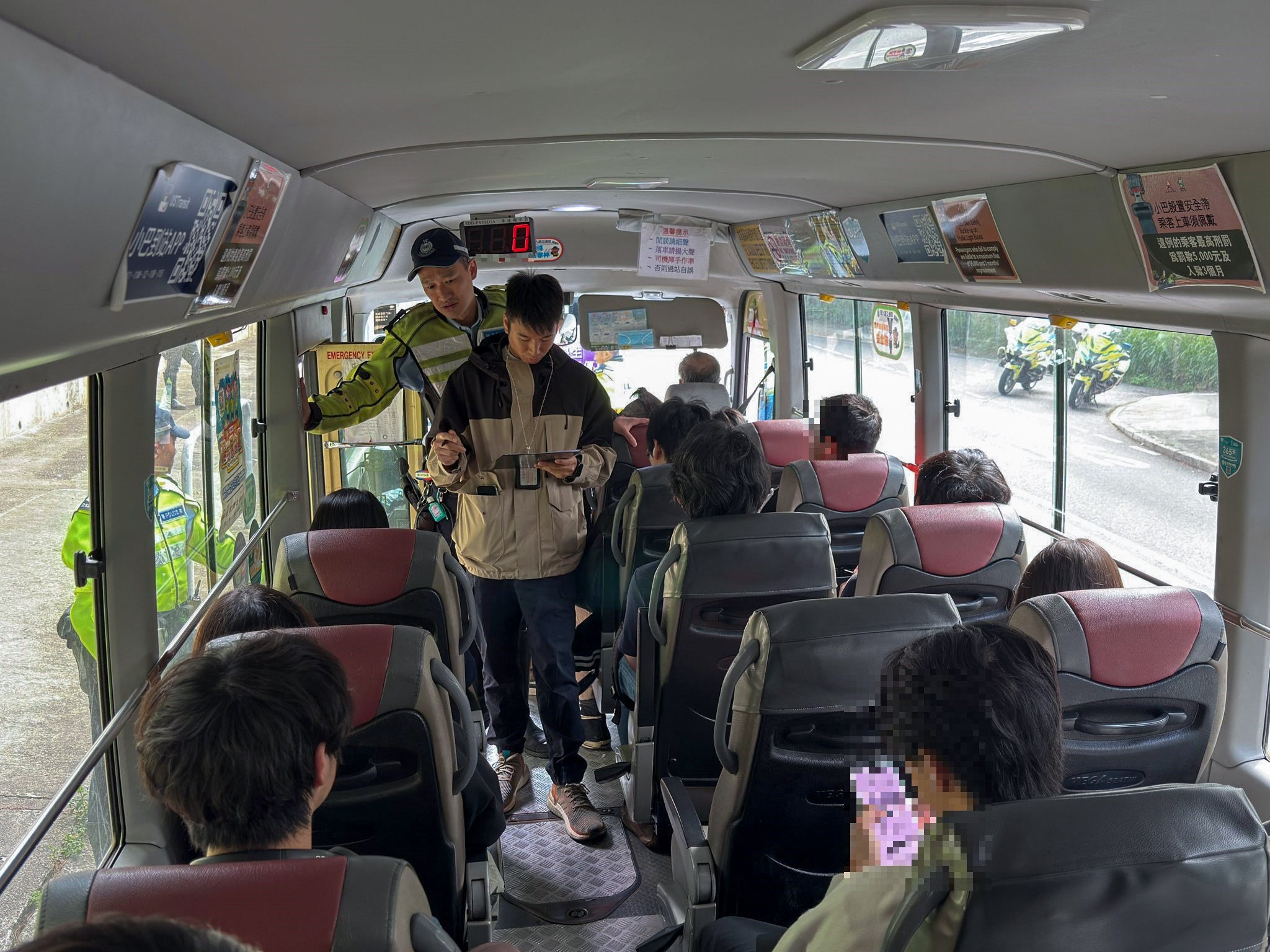 Police launch an undercover traffic law-enforcement operation in Kowloon East on October 24, issuing tickets to 31 passengers found not wearing seatbelts. Photo: Handout