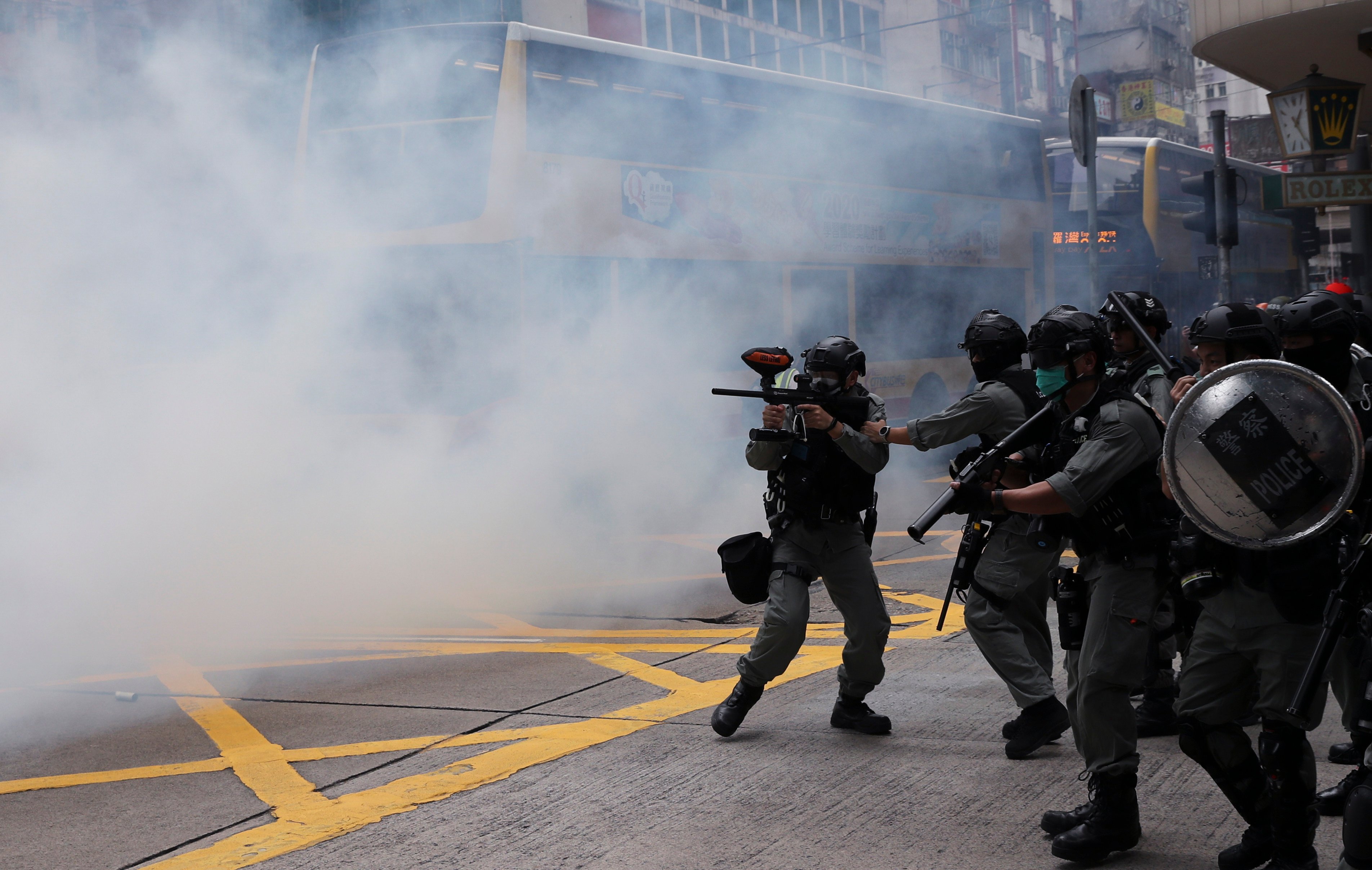 Riot police fire tear gas in Causeway Bay during the anti-government demonstrations. Photo: Sam Tsang