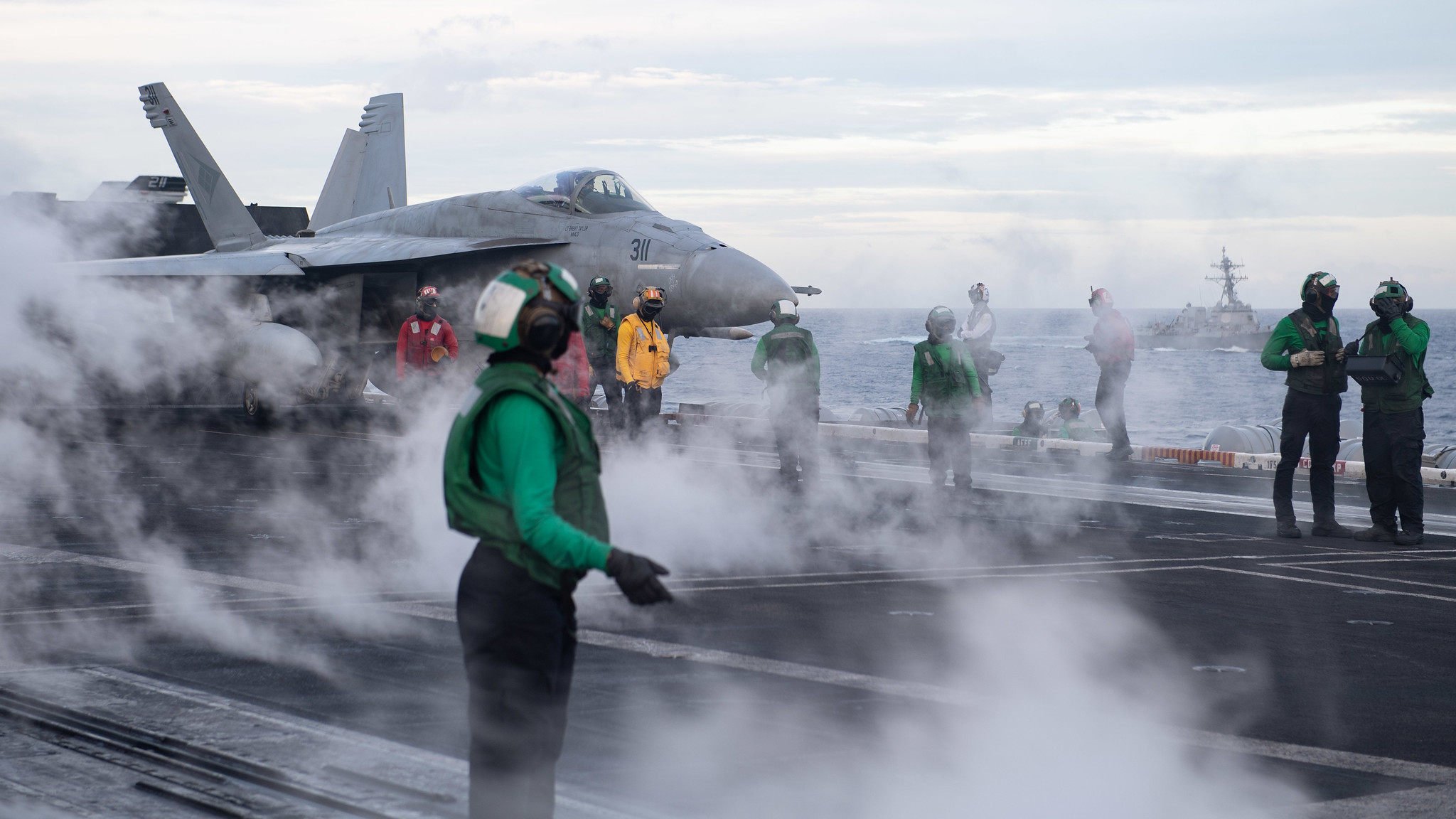 President Donald Trump called for a return to steam-powered launch systems on aircraft carriers, telling sailors that “I love the sight of that beautiful steam pouring off that deck”. Photo: US Navy