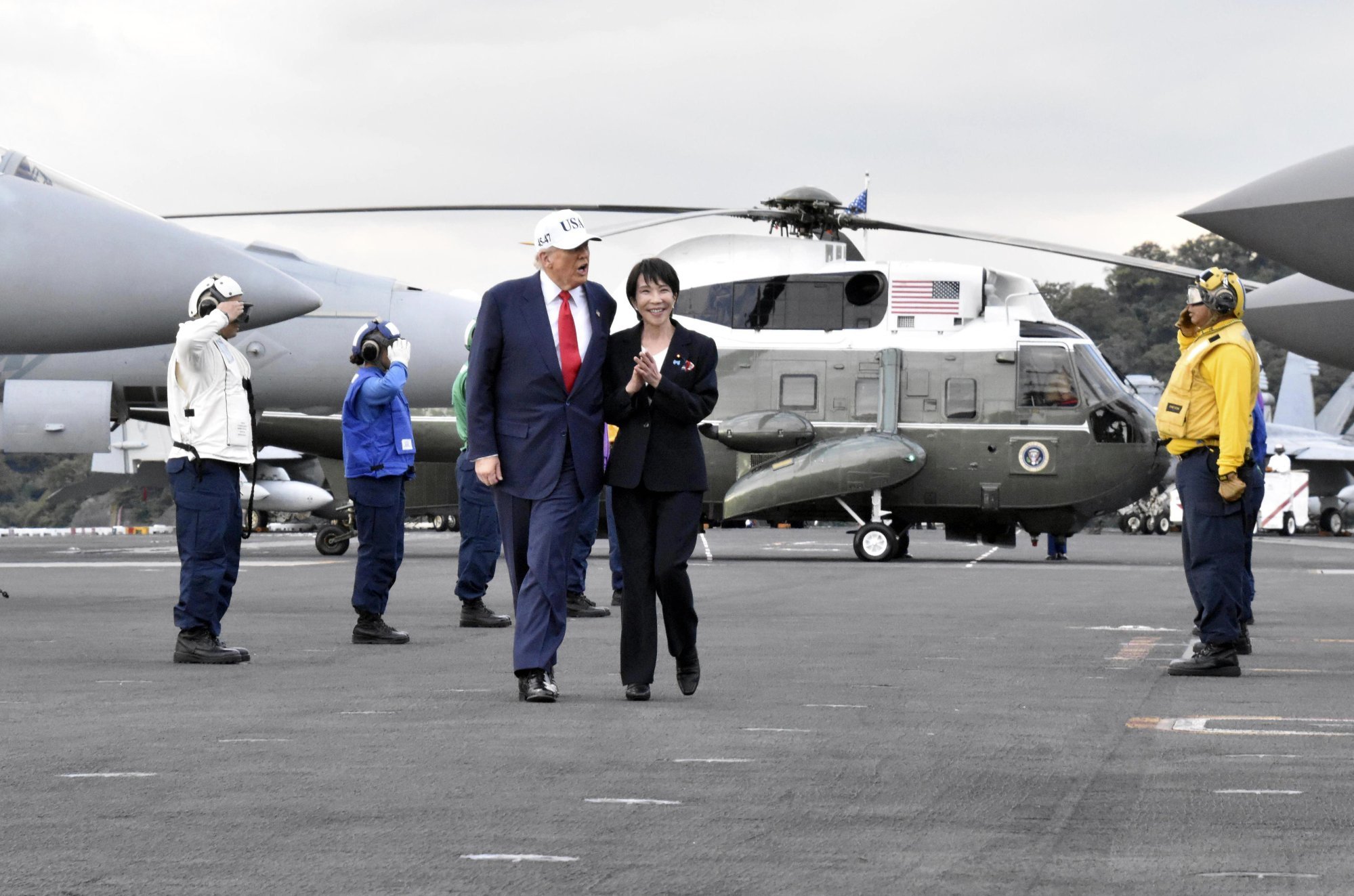 US President Donald Trump and Japanese Prime Minister Sanae Takaichi aboard the aircraft carrier USS George Washington docked at the Yokosuka naval base on Tuesday. Photo: EPA/JIJI Press US President Donald Trump and Japanese Prime Minister Sanae Takaichi aboard the aircraft carrier USS George Washington docked at the Yokosuka naval base on Tuesday. Photo: EPA/JIJI Press