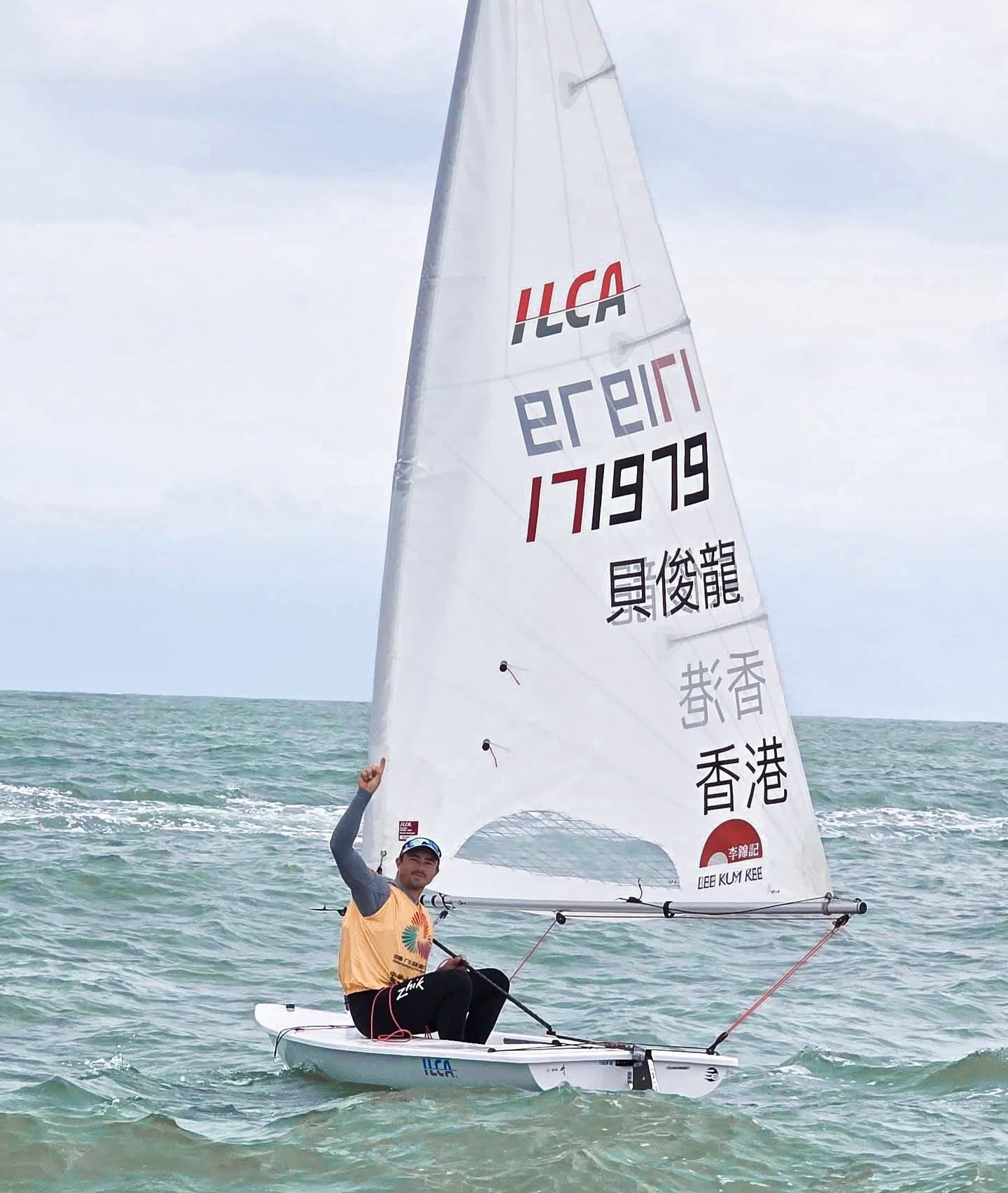Nicholas Halliday celebrates winning gold for Hong Kong on Wednesday. Photo: Sailing Federation of Hong Kong, China