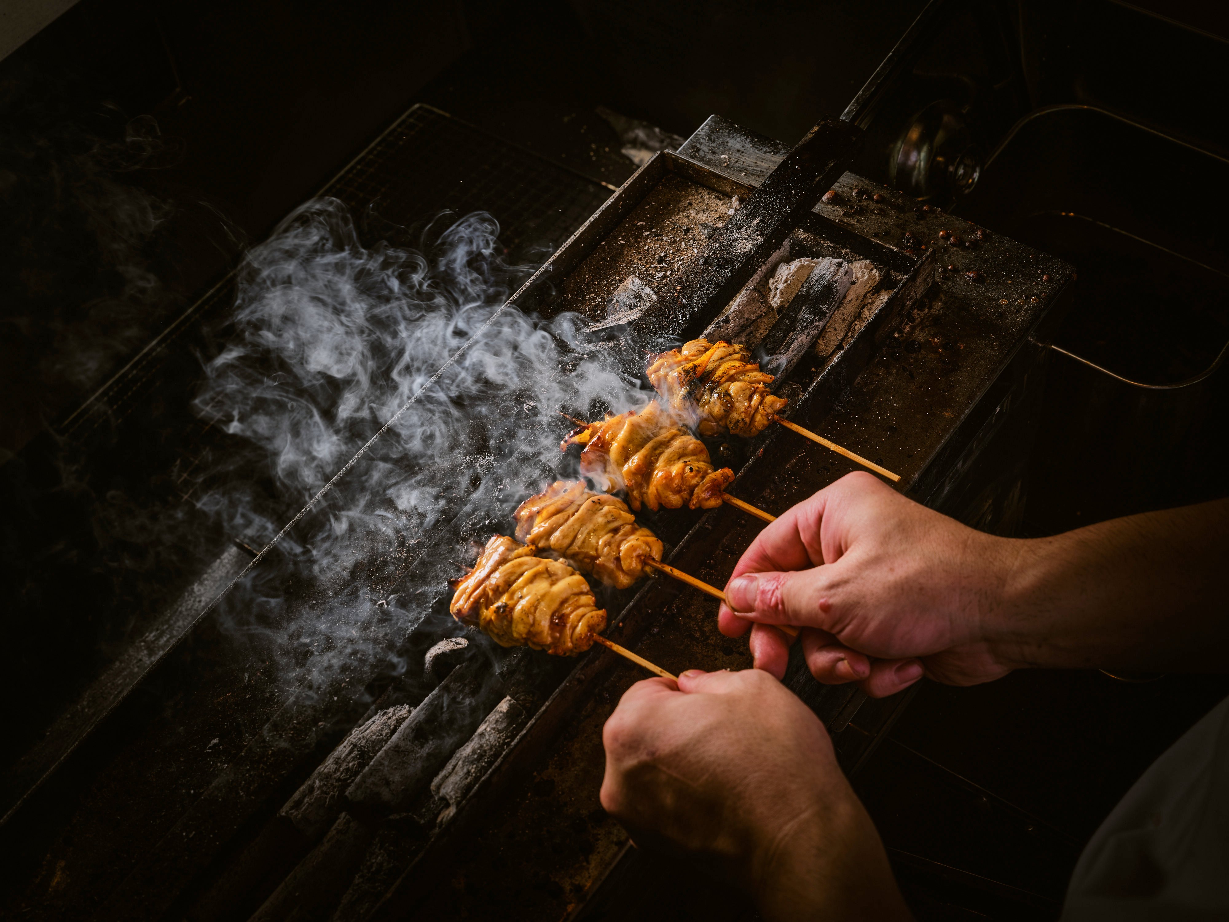 Cantonese three-yellow chicken skewers are grilled over charcoal at Yoshiteru Ikegawa’s new Hong Kong restaurant Torikaze. Charmaine Mok visits the Japanese yakitori master to talk about his inspirations and how he applies techniques from his homeland to local poultry. Photo: Torikaze