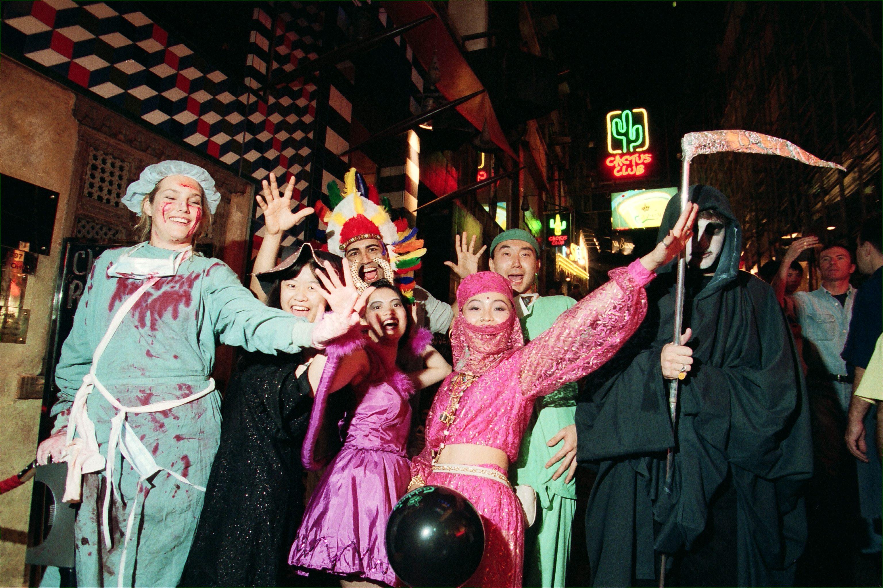 People dressed in playful costumes celebrate Halloween in Lan Kwai Fong in Hong Kong in 1995. Photo: SCMP Archives