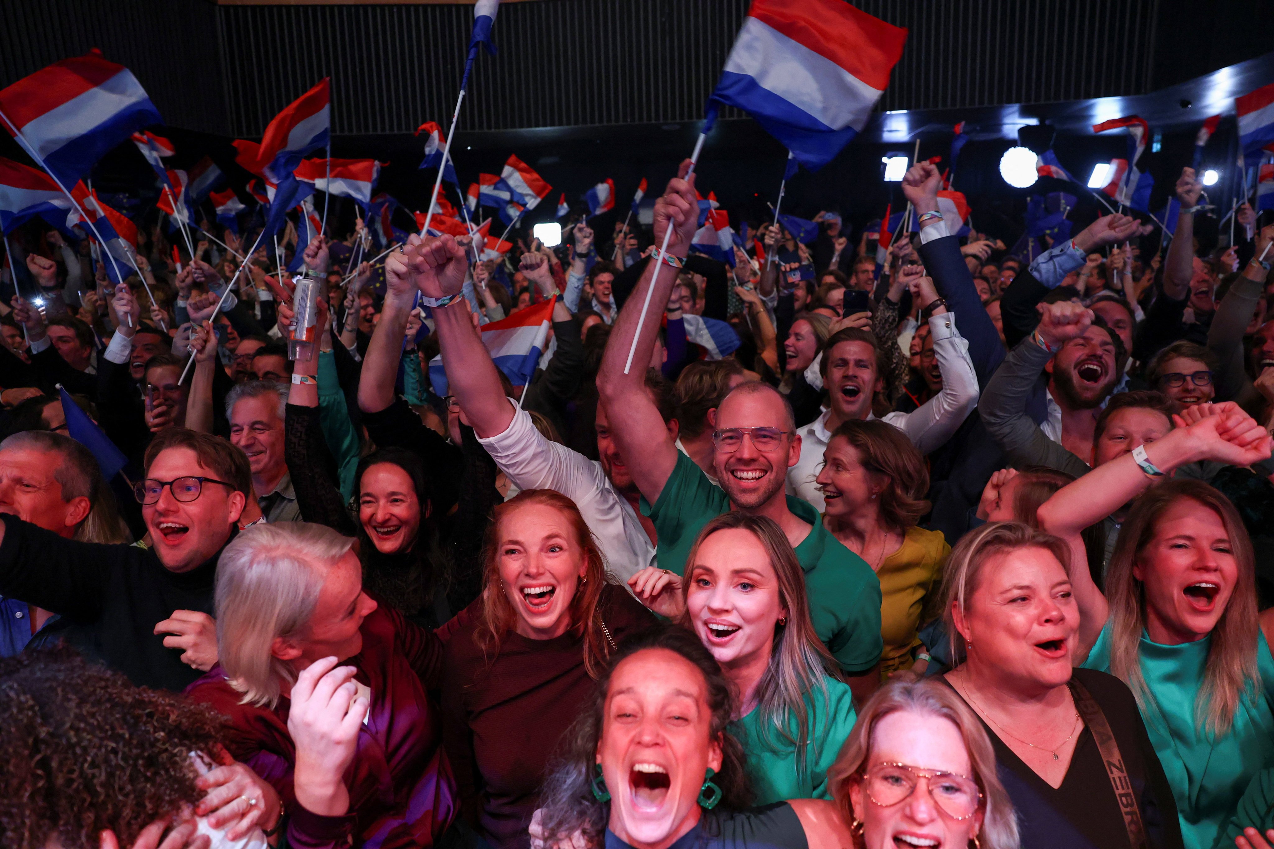 D66 supporters react to the first exit poll result in the Dutch parliamentary elections in Leiden, the Netherlands, on Wednesday. Photo: Reuters