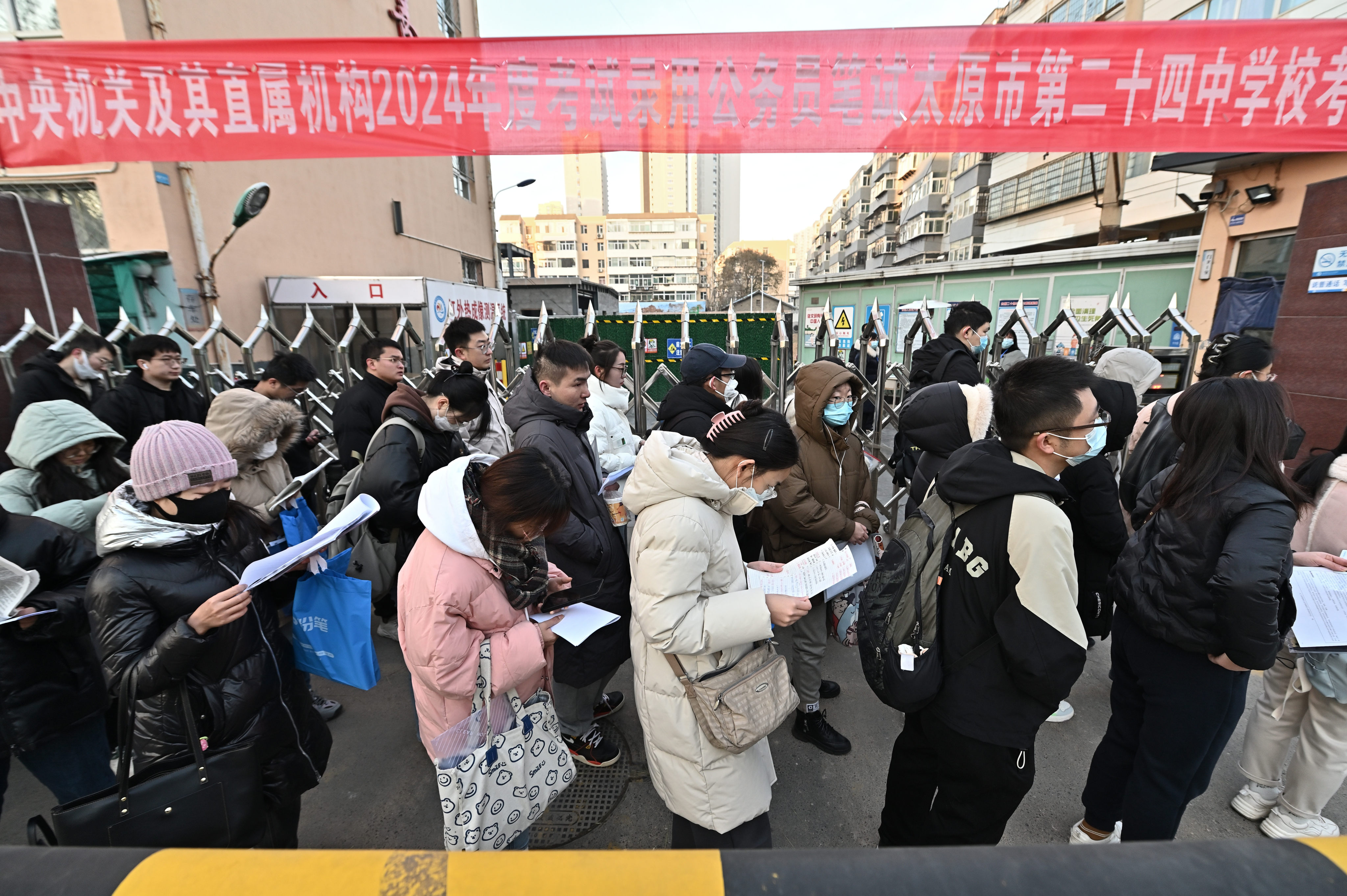 Examinees preparing to enter a venue for China’s national civil servant exam on November 26, 2023. Photo: China News Service via Getty Images