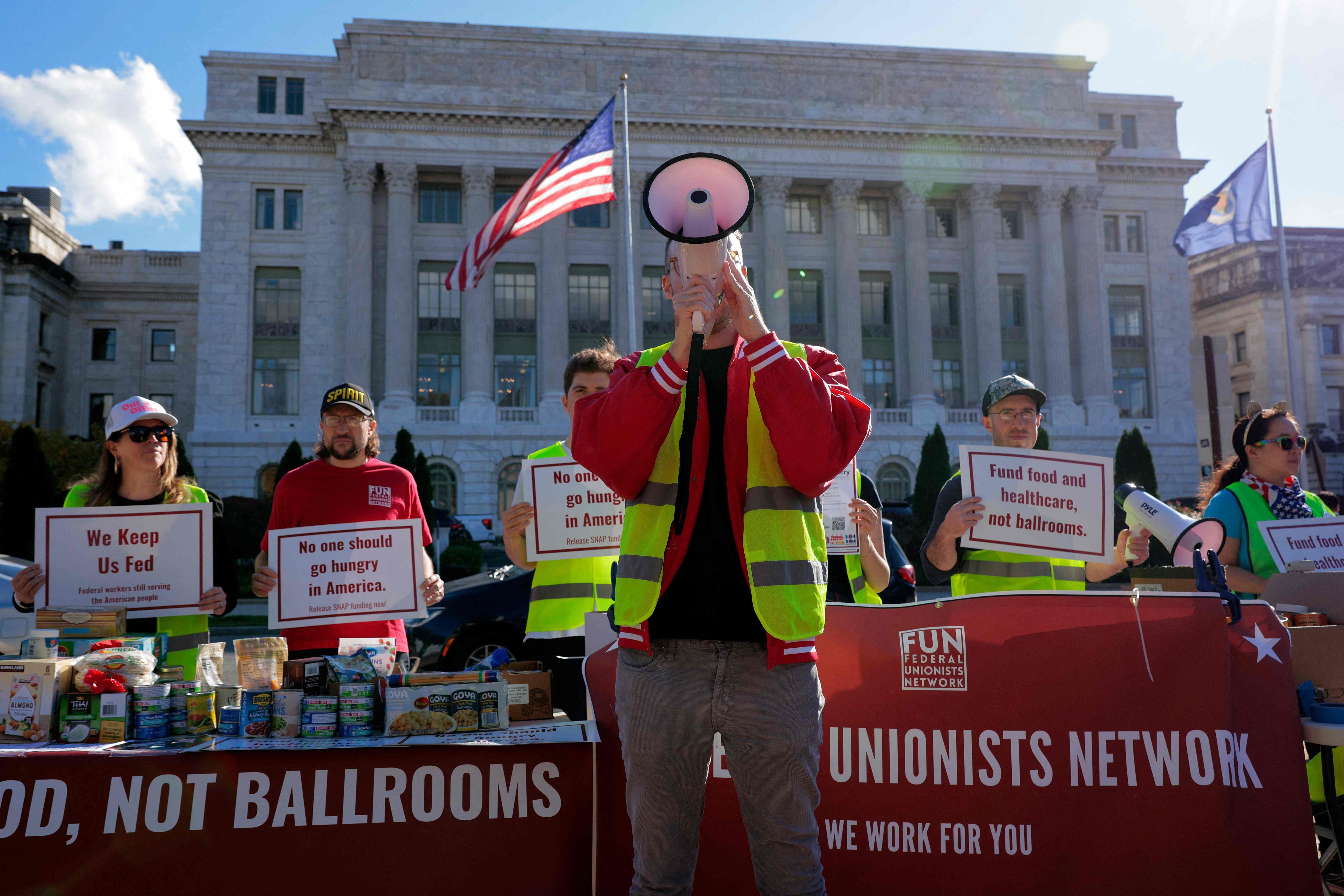 Union members and activists rally and hold a food drive in front of the US Department of Agriculture on Thursday. Photo: AFP