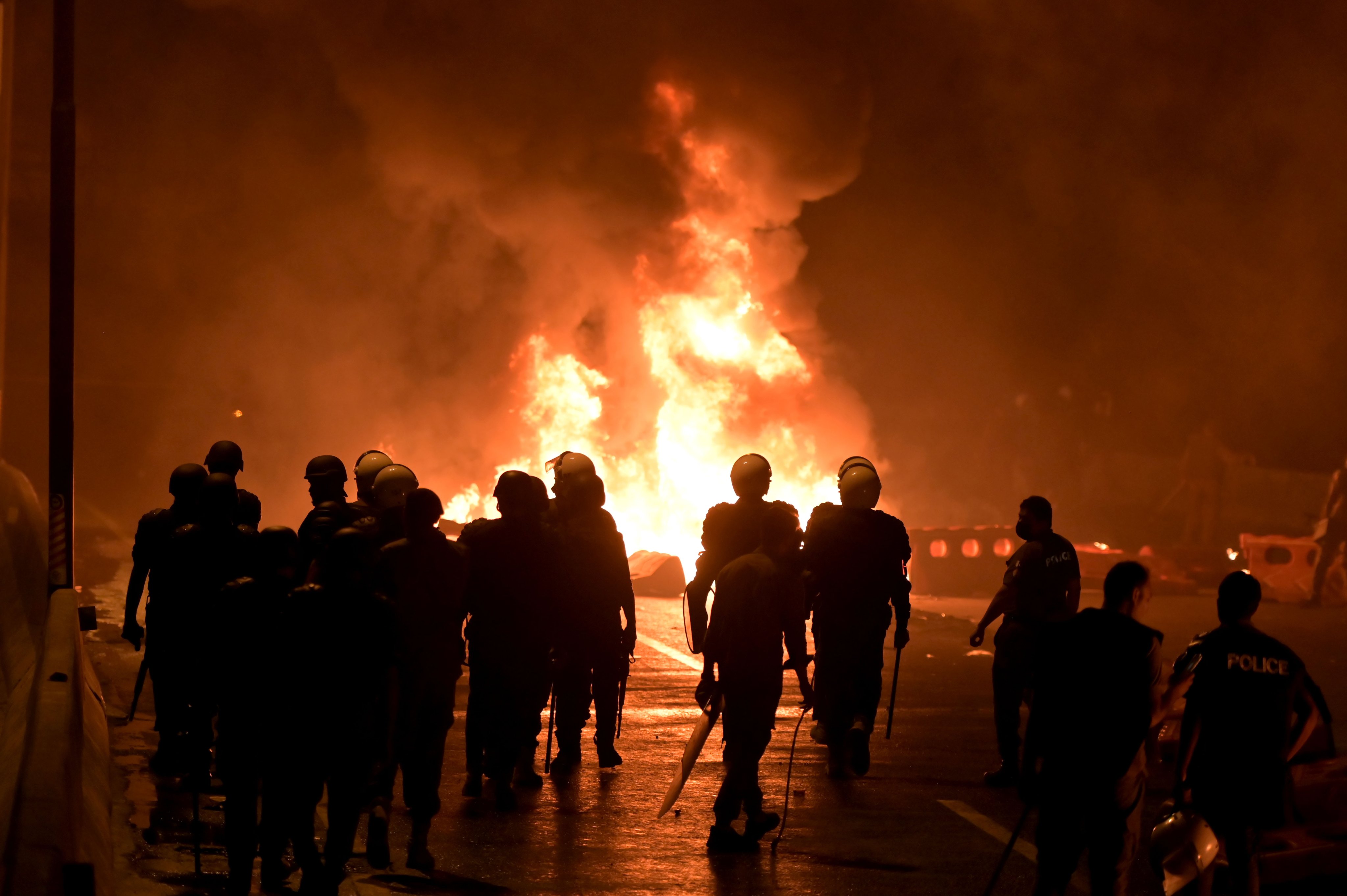 Security forces clash with TLP supporters during an anti-Israel protest near Lahore, Pakistan, on October 10. Photo: EPA