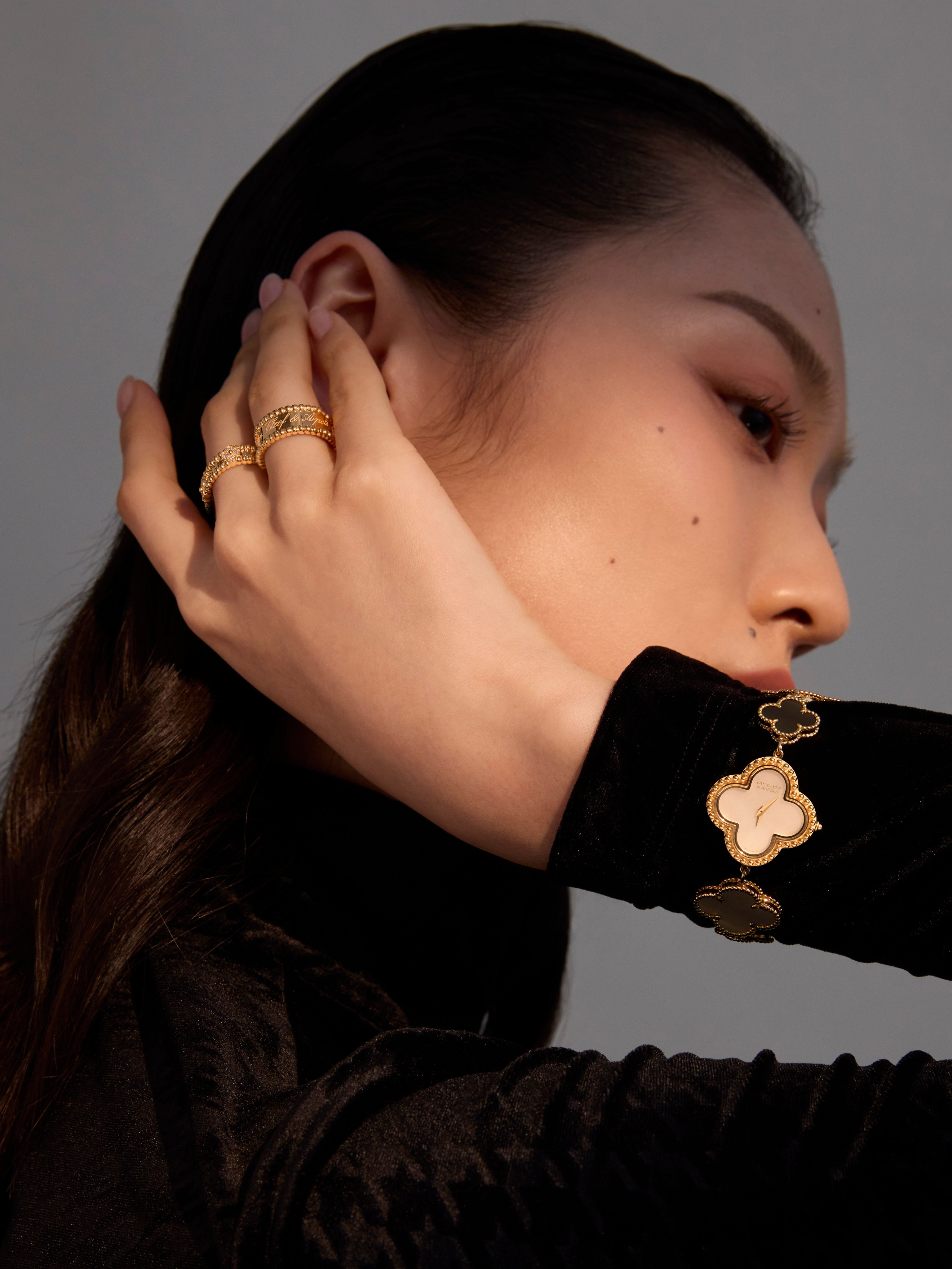Rings and a watch from Van Cleef & Arpels’ latest Alhambra collection. Top: Shiatzy Chen. Photography: Kinwai Cheung