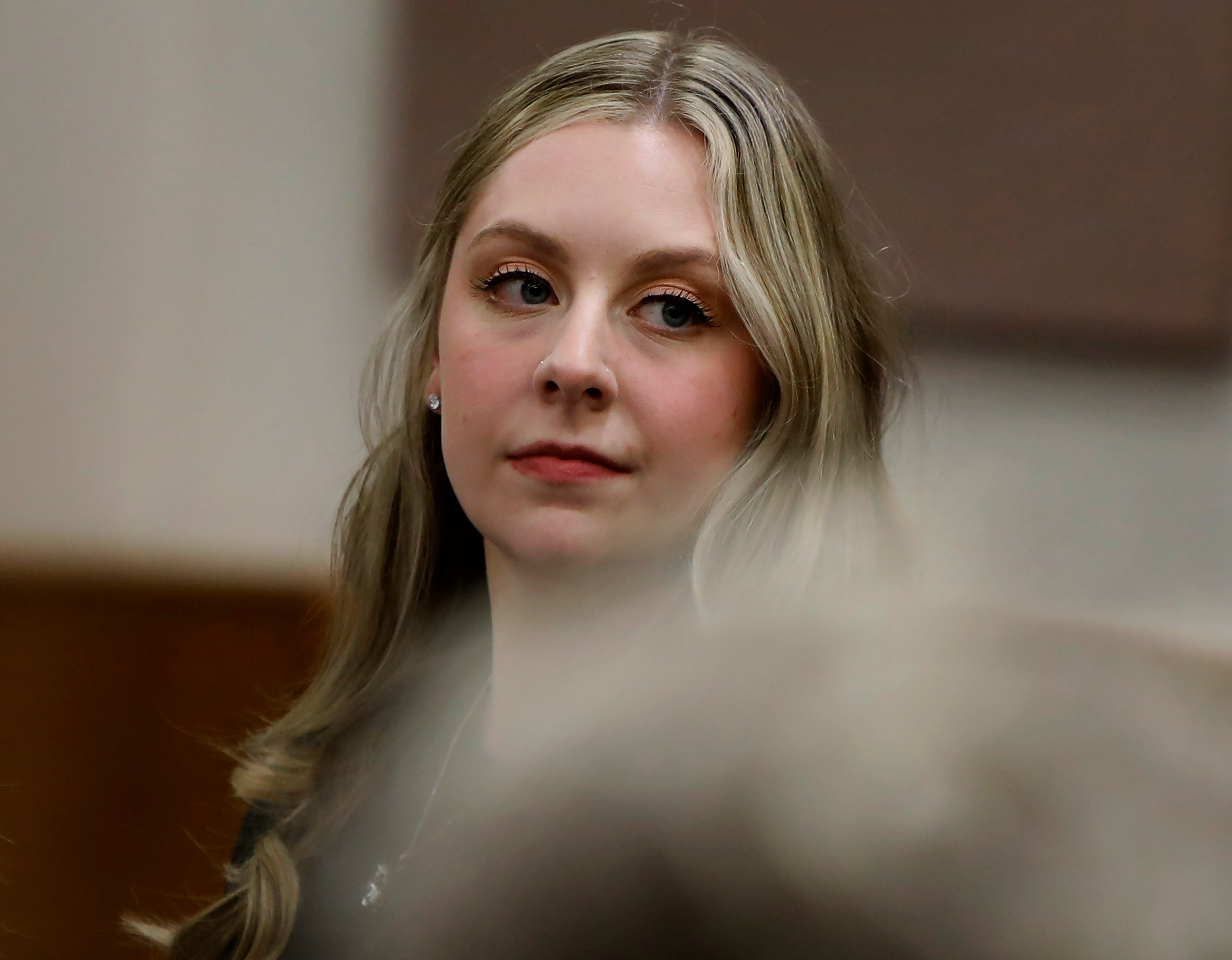 Former Richneck Elementary School teacher Abby Zwerner looks back into the courtroom in Newport News, Virginia, on Tuesday. Photo: The Virginian-Pilot via AP