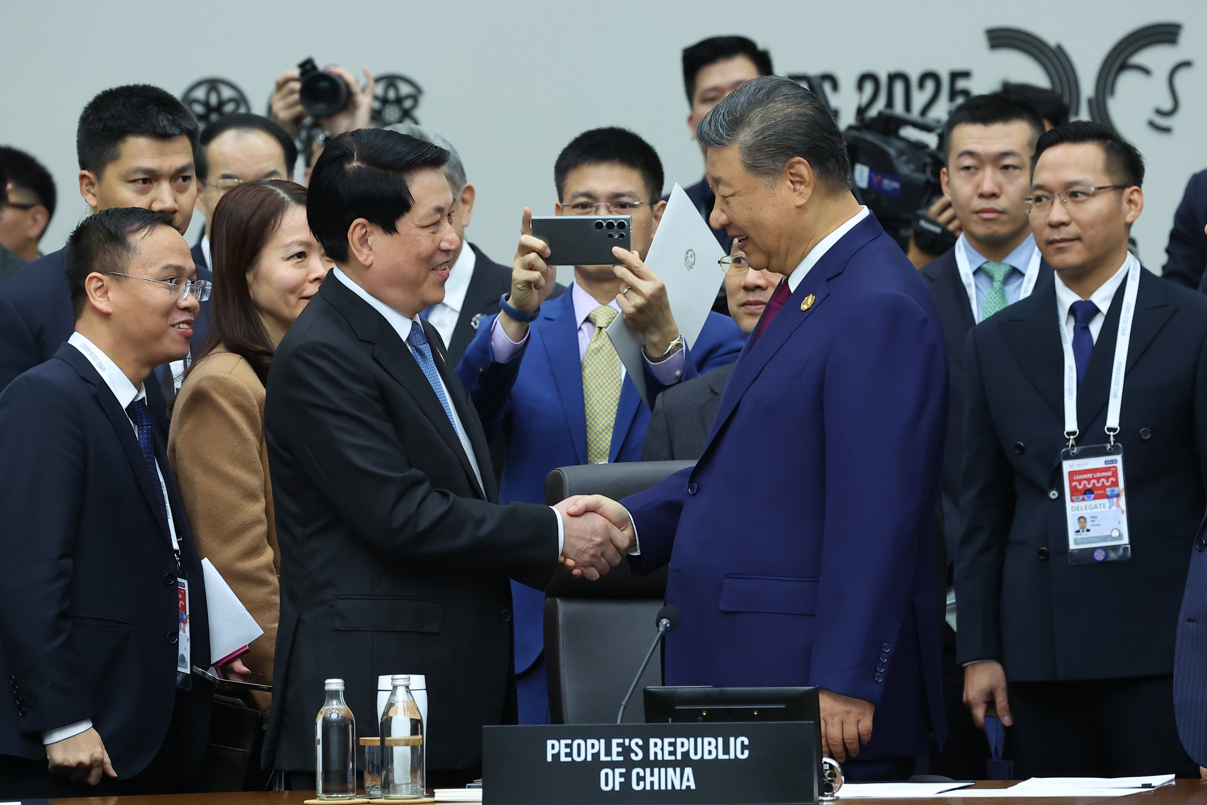 Chinese President Xi Jinping (front, right), shakes hands with Vietnam’s President Luong Cuong at the Apec Leaders’ Meeting in Gyeongju, South Korea on Friday. Photo: AP