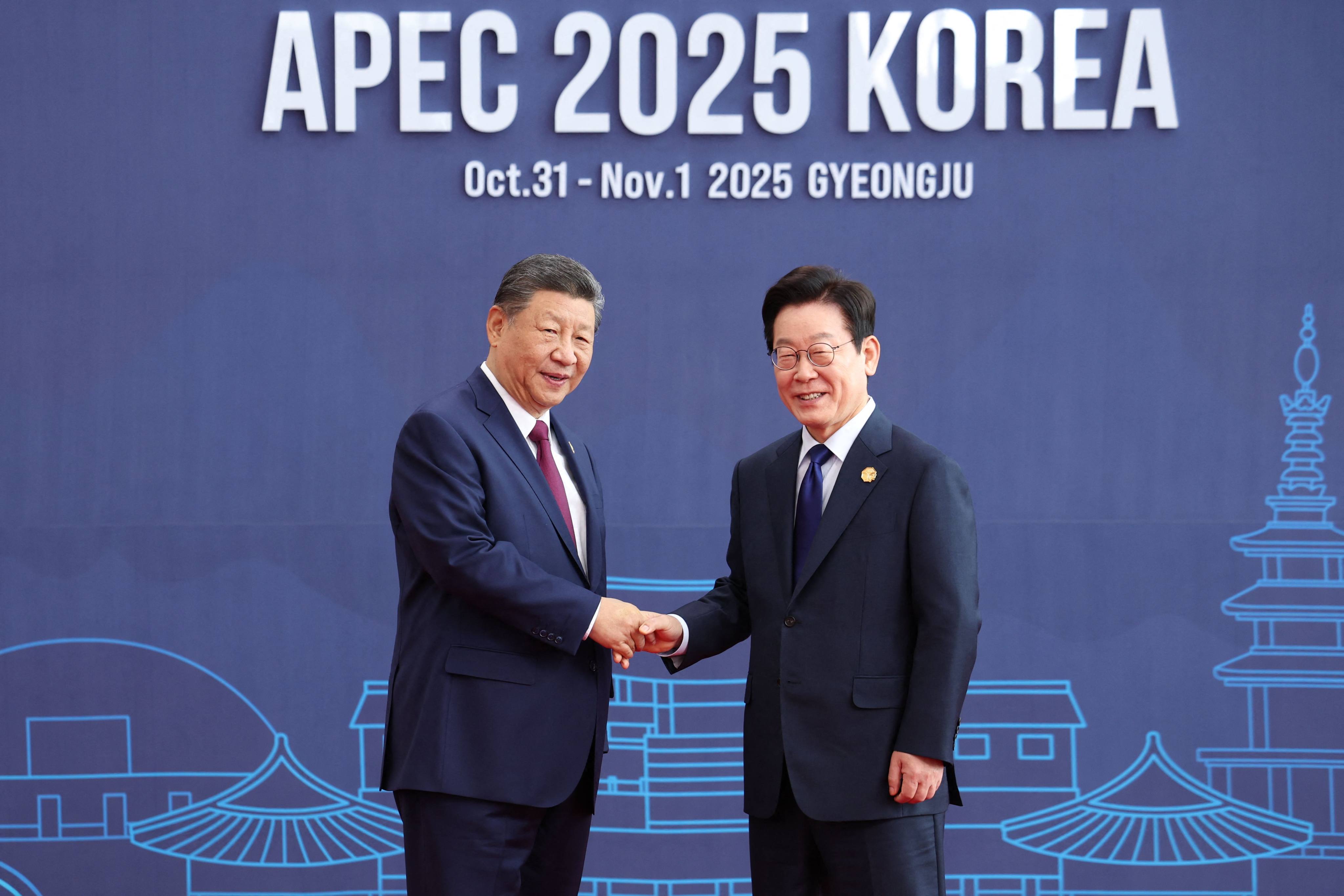 South Korean President Lee Jae-myung (right) welcomes China’s President Xi Jinping to the Asia-Pacific Economic Cooperation (Apec) Economic Leaders’ Meeting in Gyeongju, South Korea on Friday. Photo: AFP/Apec 2025 Korea via Yonhap/Handout