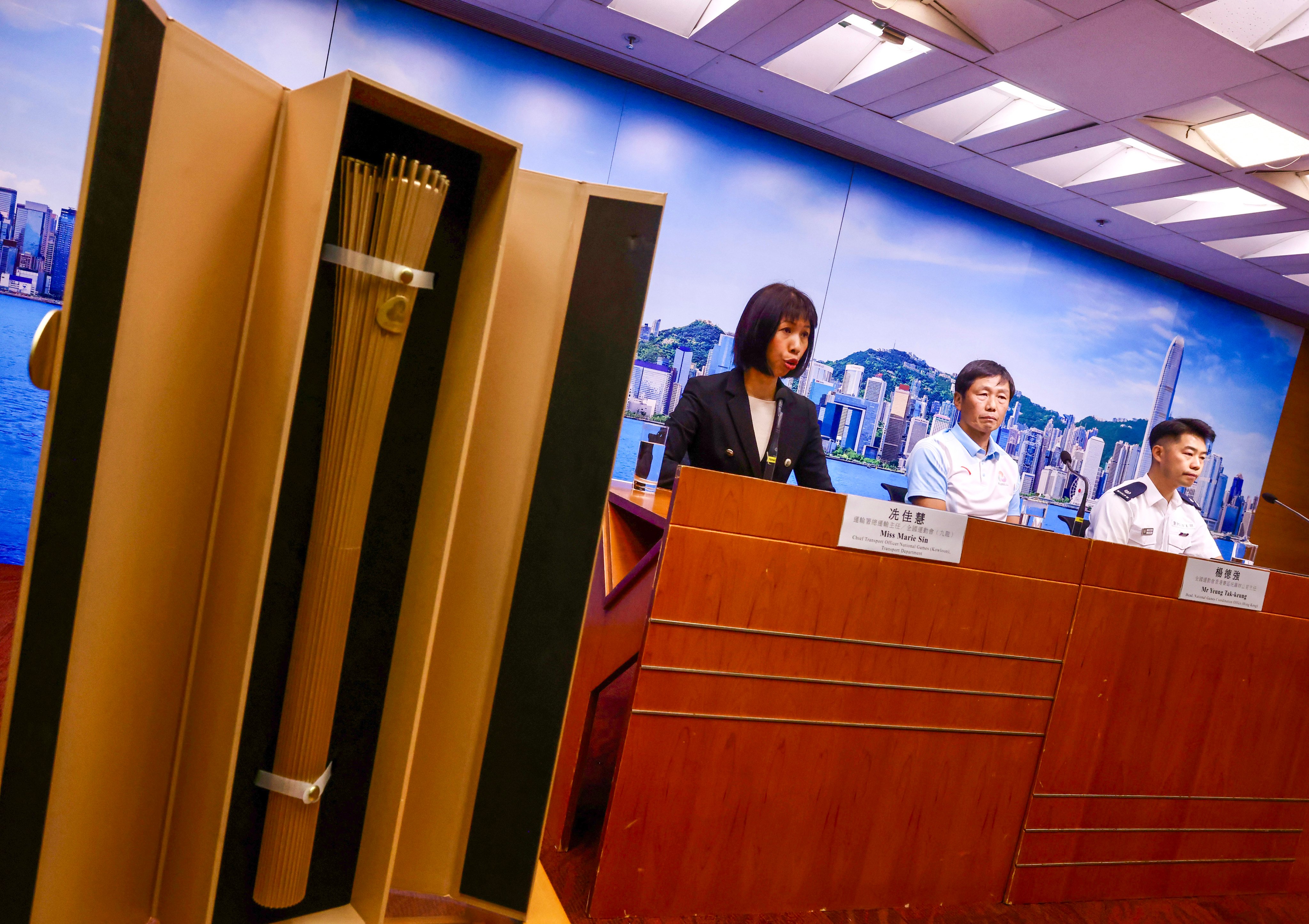 (From left) Chief Transport Officer Marie Sin, National Games Coordination Office Hong Kong head Yeung Tak-keung and Superintendent Aubrey Siu of the police force. Photo: Jonathan Wong