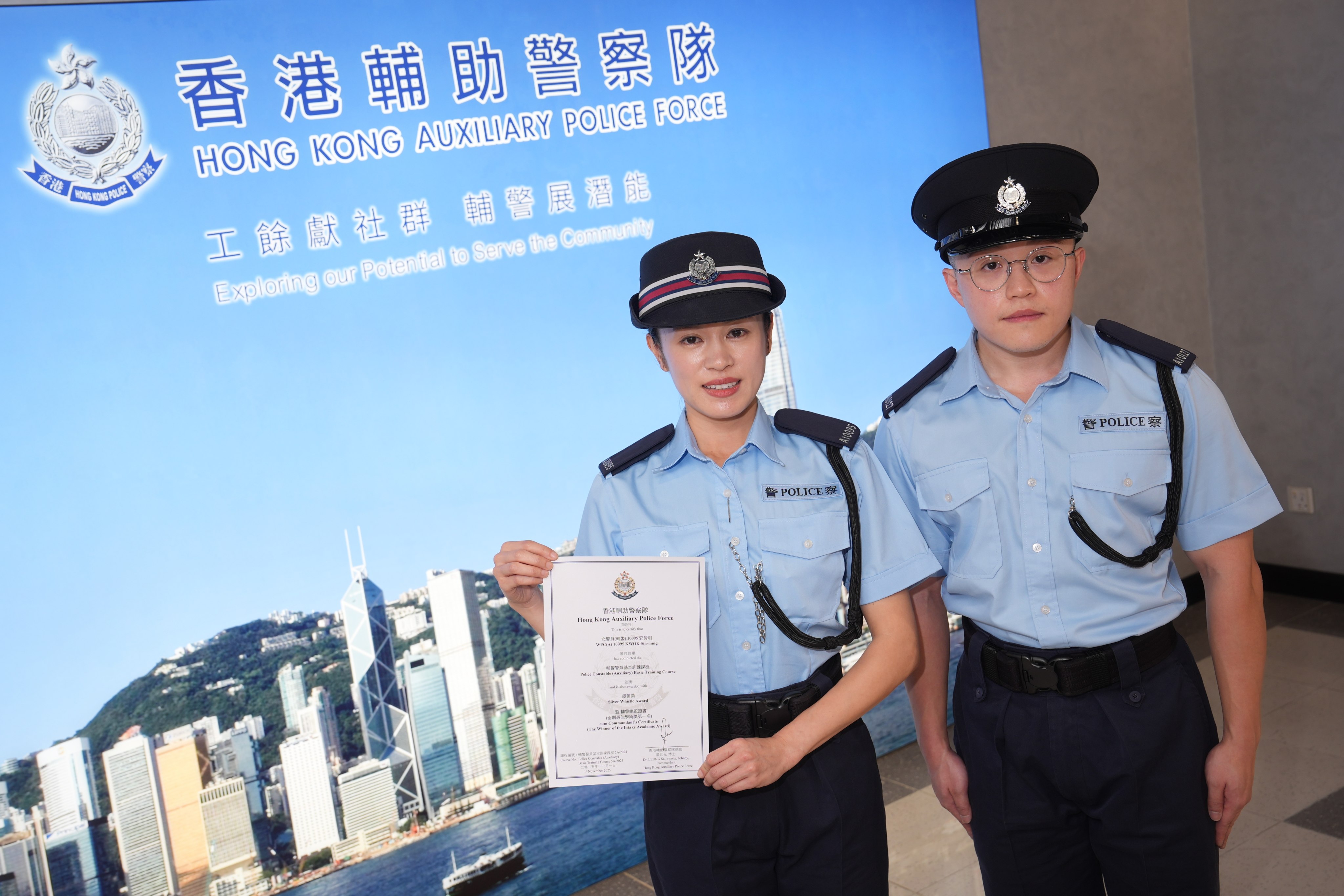 Auxiliary police constables Patrick Sin (right) and Belle Kwok. Photo: Elson Li