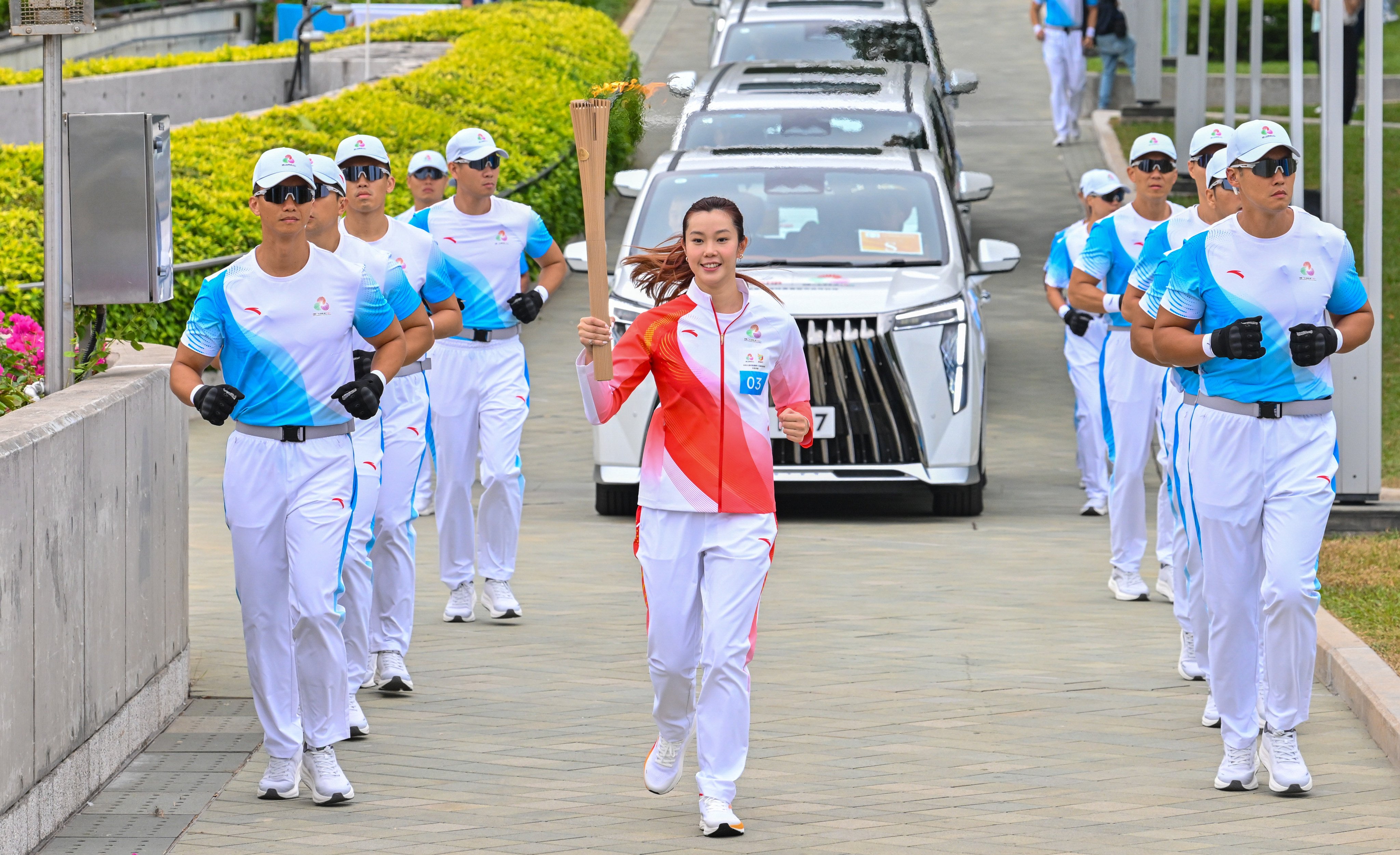 Stephanie Au had the honour of being the third torch bearer on Sunday. Photo: ISD