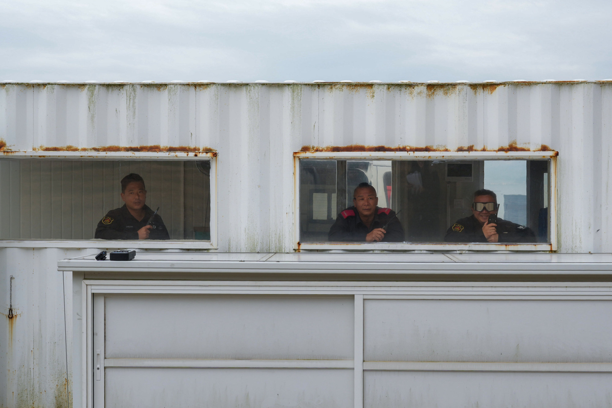 Superintendent Andy Cheung (left) and his teammates demonstrate the use of a detonator, C4 explosive and detonation cord. Photo: May Tse Superintendent Andy Cheung (left) and his teammates demonstrate the use of a detonator, C4 explosive and detonation cord. Photo: May Tse